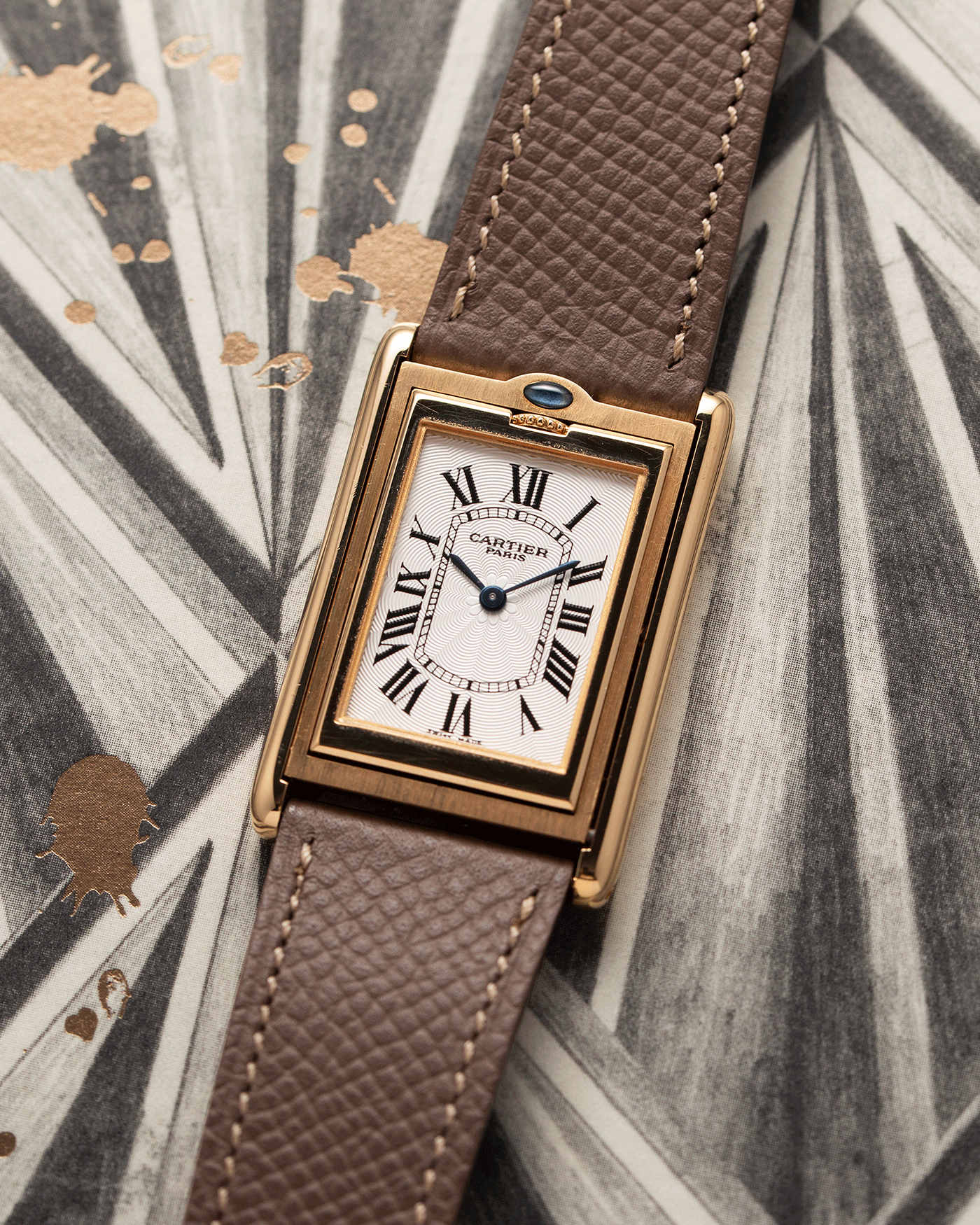 Brand: Cartier Year: 2001 Model: Tank Basculante Material: 18k Yellow Gold Movement: Cartier Cal. 610 (F. Piguet) Case Diameter: 25mm x 39mm Strap: Nostime Taupe Textured Calf and 18k Yellow Gold Deployant Clasp