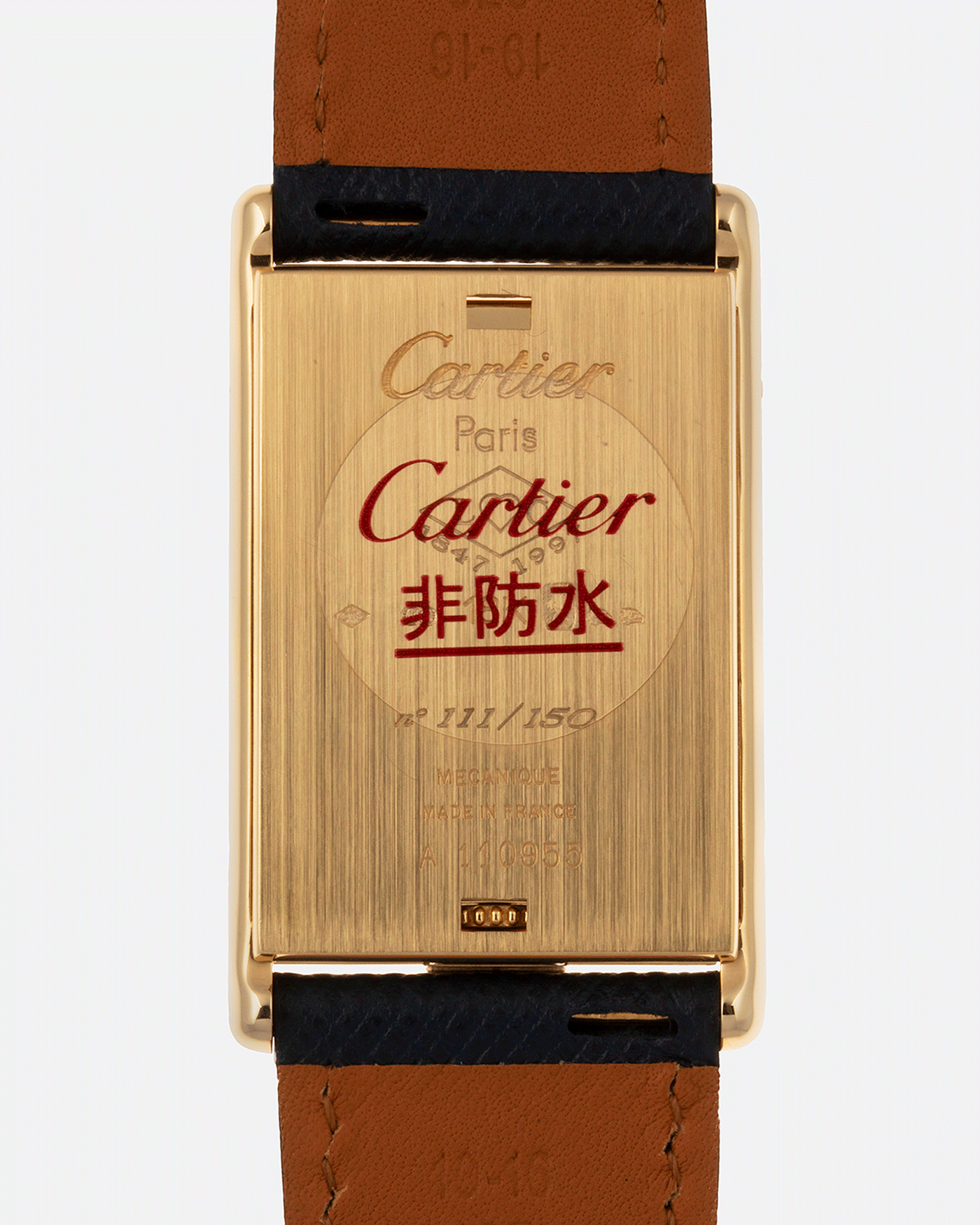 Brand: Cartier Year: 1997 Model: Tank Basculante ‘I Love Cartier’ 150th Anniversary Material: 18k Yellow Gold Movement: Cartier Cal. 610 (F. Piguet) Case Diameter: 22 x 38mm Strap: Navy Blue Molequin Textured Calf Strap with separate 18k Yellow Gold Cartier Tang Buckle