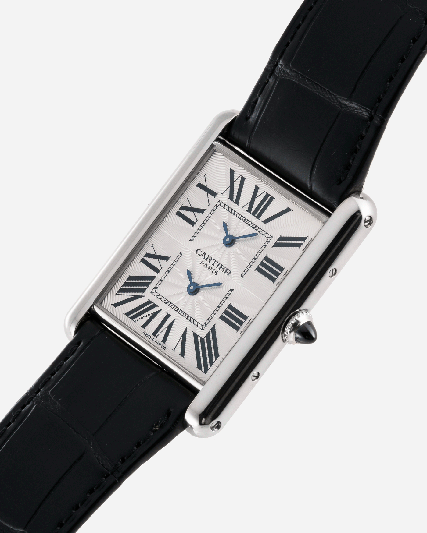 Brand: Cartier Year: 2010 Model: CPCP Tank Two Time Zone Reference: 2917 Material: 18k White Gold Movement: Piaget-Based Manually Wound Cal. 9901 MC Case Diameter: 29.3mm width, 38.3mm length Strap: Cartier Black Alligator Strap with 18k White Gold Cartier Deployant Clasp