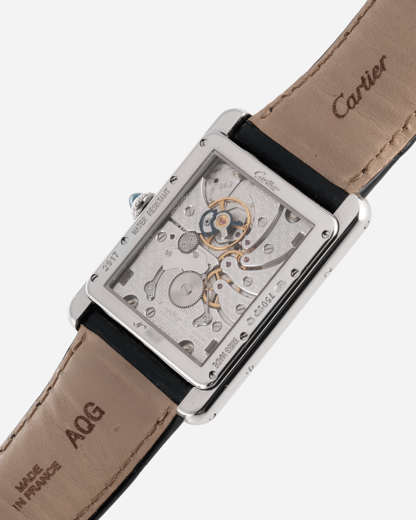 Brand: Cartier Year: 2010 Model: CPCP Tank Two Time Zone Reference: 2917 Material: 18k White Gold Movement: Piaget-Based Manually Wound Cal. 9901 MC Case Diameter: 29.3mm width, 38.3mm length Strap: Cartier Black Alligator Strap with 18k White Gold Cartier Deployant Clasp