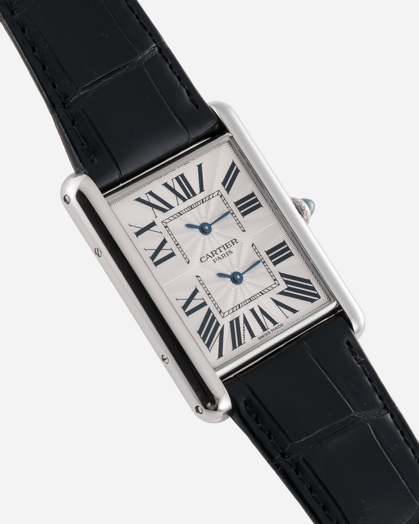 Brand: Cartier Year: 2010 Model: CPCP Tank Two Time Zone Reference: 2917 Material: 18k White Gold Movement: Piaget-Based Manually Wound Cal. 9901 MC Case Diameter: 29.3mm width, 38.3mm length Strap: Cartier Black Alligator Strap with 18k White Gold Cartier Deployant Clasp