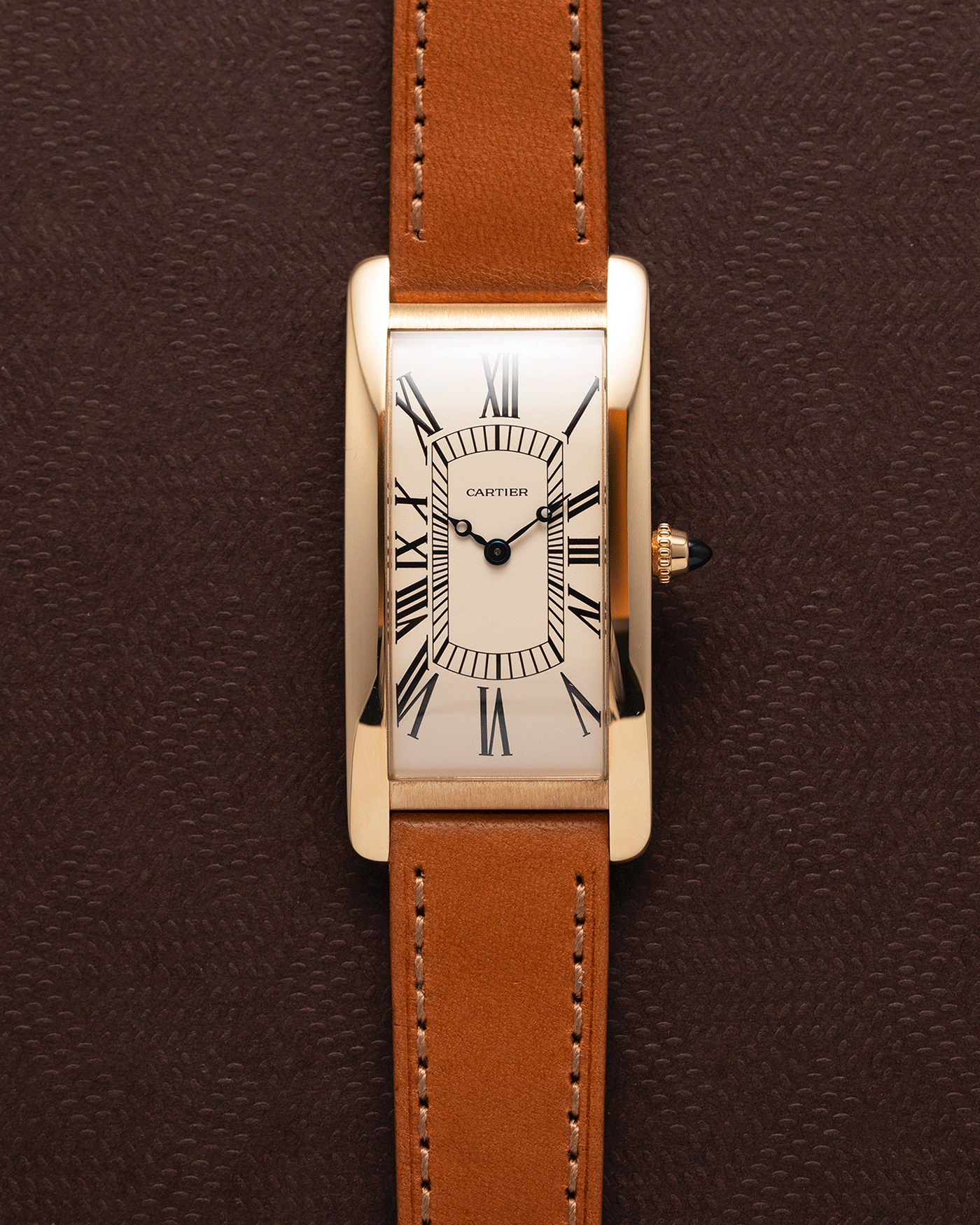Brand: Cartier Year: 2021 Model: Tank Cintree Reference: 2718 Material: 18k Yellow Gold Movement: Jaeger Le Coultre manual wind caliber 9780MC Case Diameter: 46 x 23 mm, 6.4mm thick Strap: Cartier Chestnut Brown Leather Strap and 18k Yellow Gold Tang Buckle