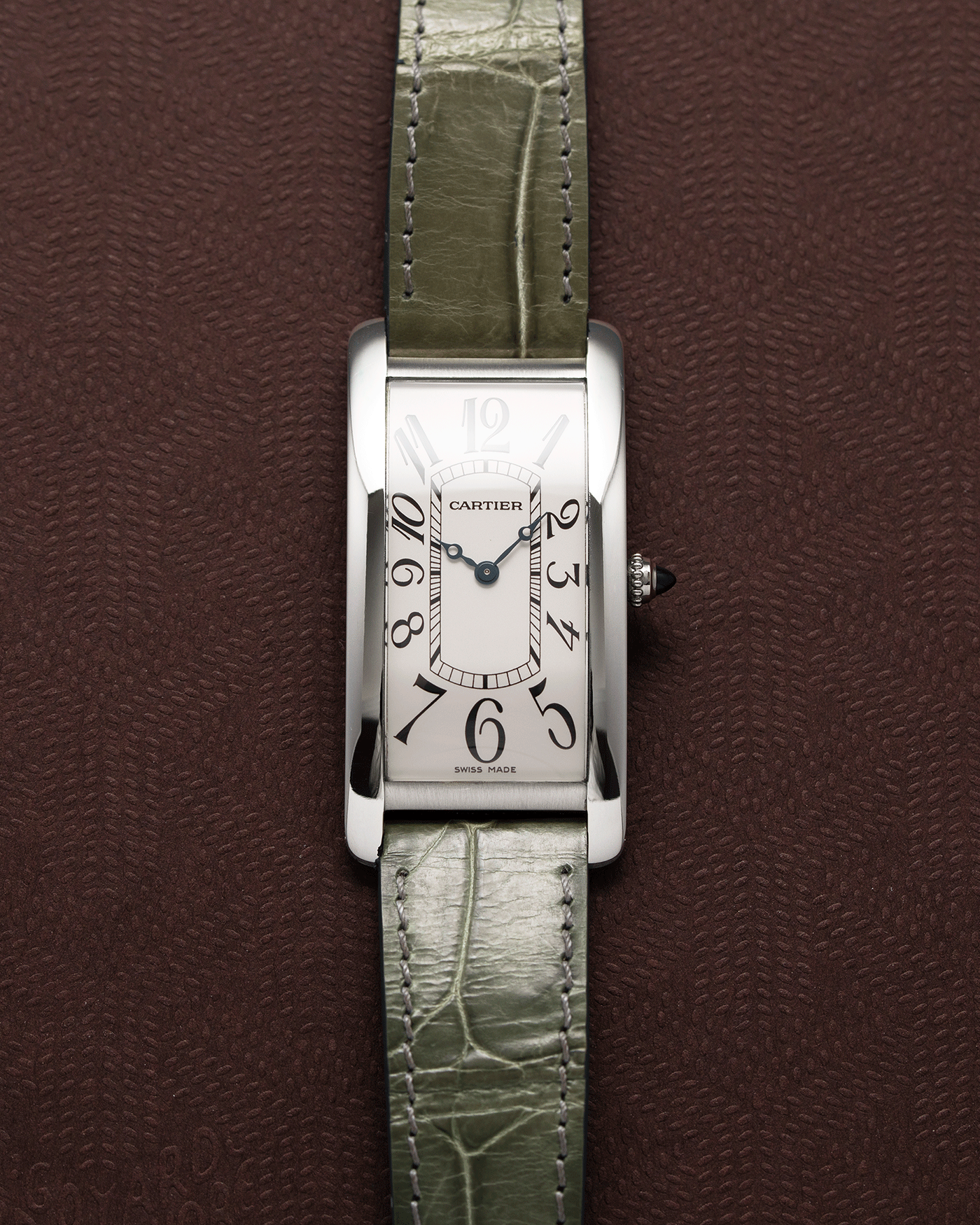 Brand: Cartier Year: 2005 Model: CPCP Collection Prive Tank Cintree Reference: 2843 Material: Platinum Movement: Jaeger Le Coultre manual wind caliber 9770MC Case Diameter: 46 x 23 mm Strap: Moss Green Alligator Strap with Platinum Cartier Deployant Clasp