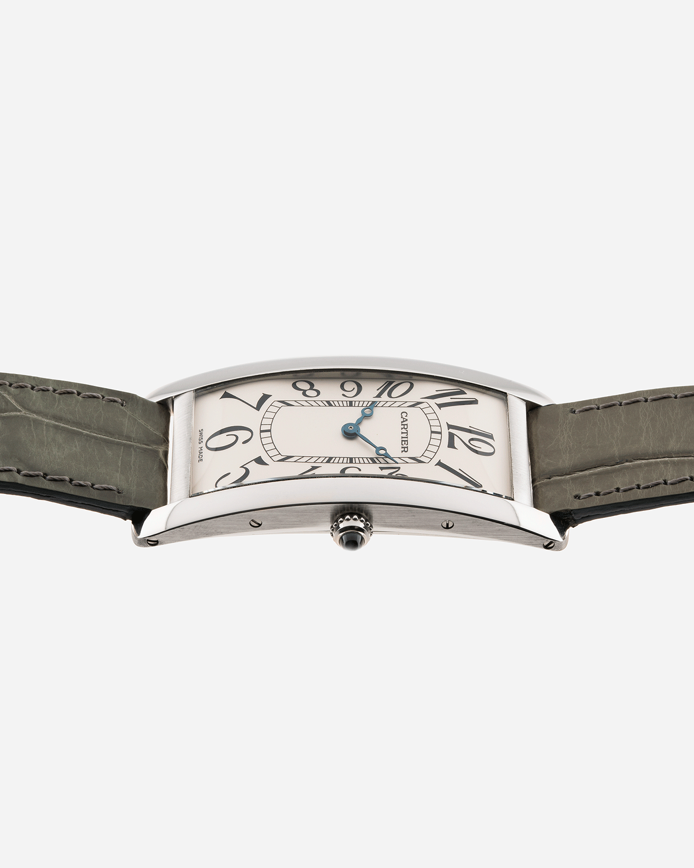 Brand: Cartier Year: 2005 Model: CPCP Collection Prive Tank Cintree Reference: 2843 Material: Platinum Movement: Jaeger Le Coultre manual wind caliber 9770MC Case Diameter: 46 x 23 mm Strap: Moss Green Alligator Strap with Platinum Cartier Deployant Clasp