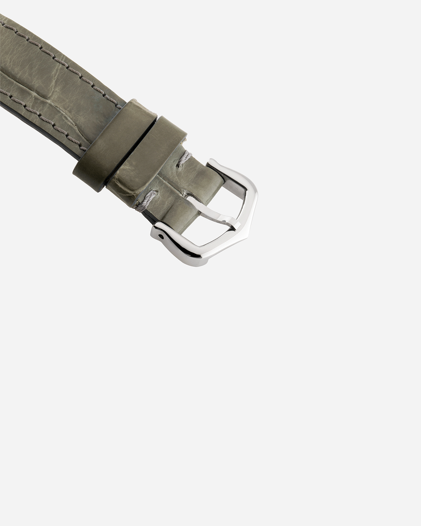Brand: Cartier Year: 2005 Model: CPCP Collection Prive Tank Cintree Reference: 2843 Material: Platinum Movement: Jaeger Le Coultre manual wind caliber 9770MC Case Diameter: 46 x 23 mm Strap: Moss Green Alligator Strap with Platinum Cartier Deployant Clasp