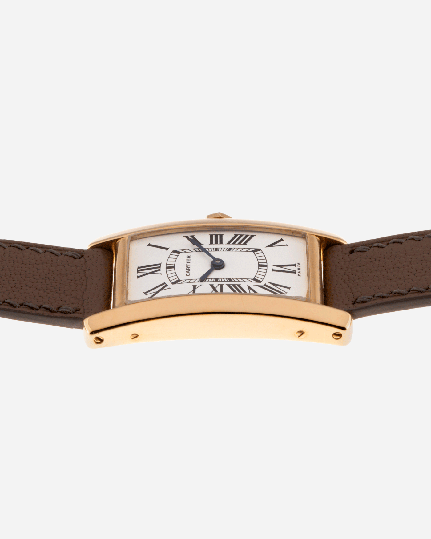 Brand: Cartier Year: 1970’s Model: Tank Cintree Mid Size Material: 18k Yellow Gold Movement: Manually Wound Jaeger Movement Case Diameter: 36mm X 20mm Strap: Custom Taupe Leather Strap and Original 18k Yellow Gold Cartier Deployant