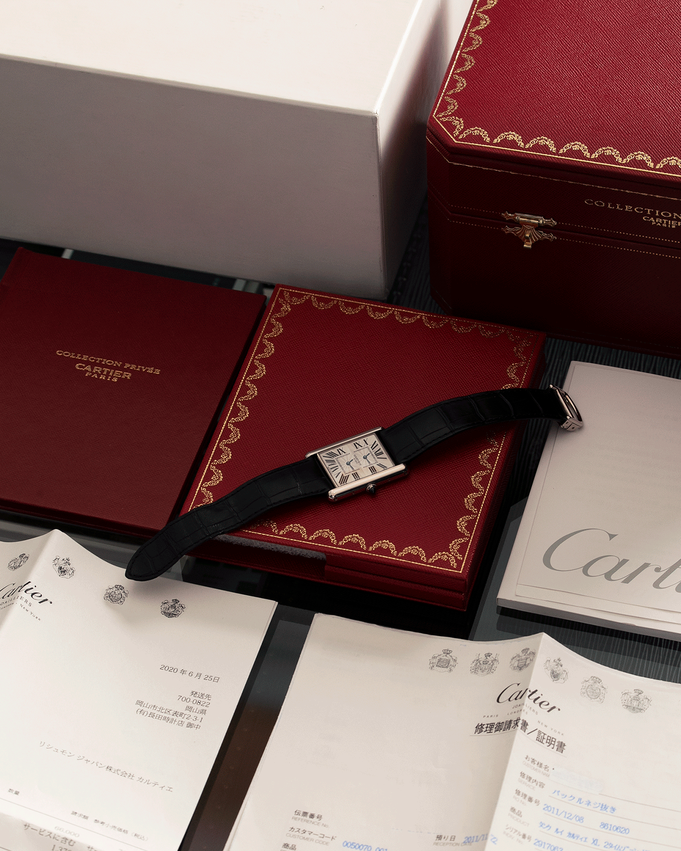 Brand: Cartier Year: 2010 Model: CPCP Tank Two Time Zone Reference: 2917 Material: 18k White Gold Movement: Piaget-Based Manually Wound Cal. 9901 MC Case Diameter: 29.3mm width, 38.3mm length Strap: Cartier Black Alligator Strap with 18k White Gold Cartier Deployant Clasp