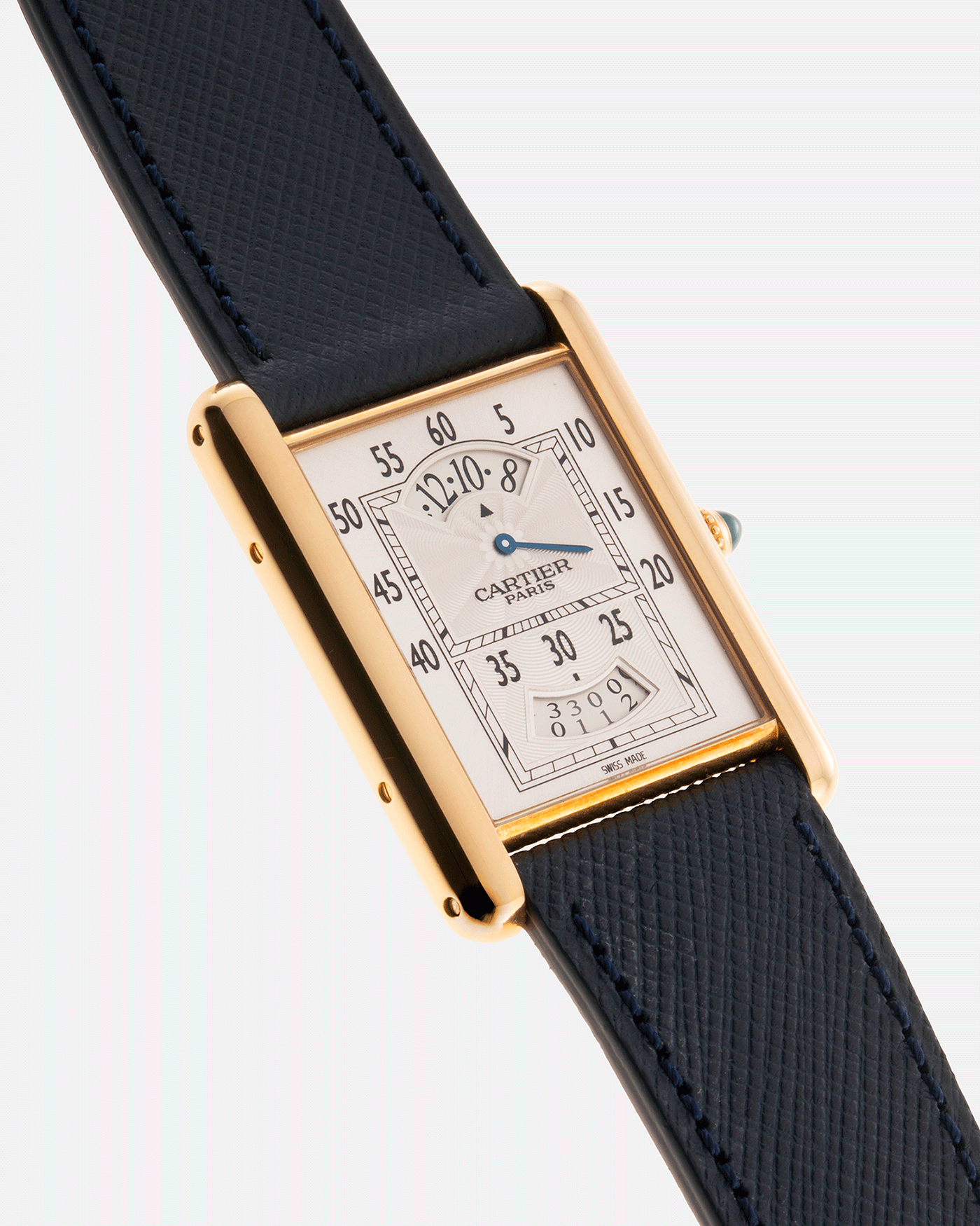 Brand: Cartier Year: 2005 Model: Collection Prive Tank Louis Cartier Wandering Hours Reference: 2918 Material: 18k Rose Gold Movement: Piaget-Based Manually Wound Cal. 9902 MC Case Diameter: 28mm width, 40.5mm lug to lug Strap: Navy Blue Molequin Textured Calf Strap with separate 18k Cartier Rose Gold Deployant