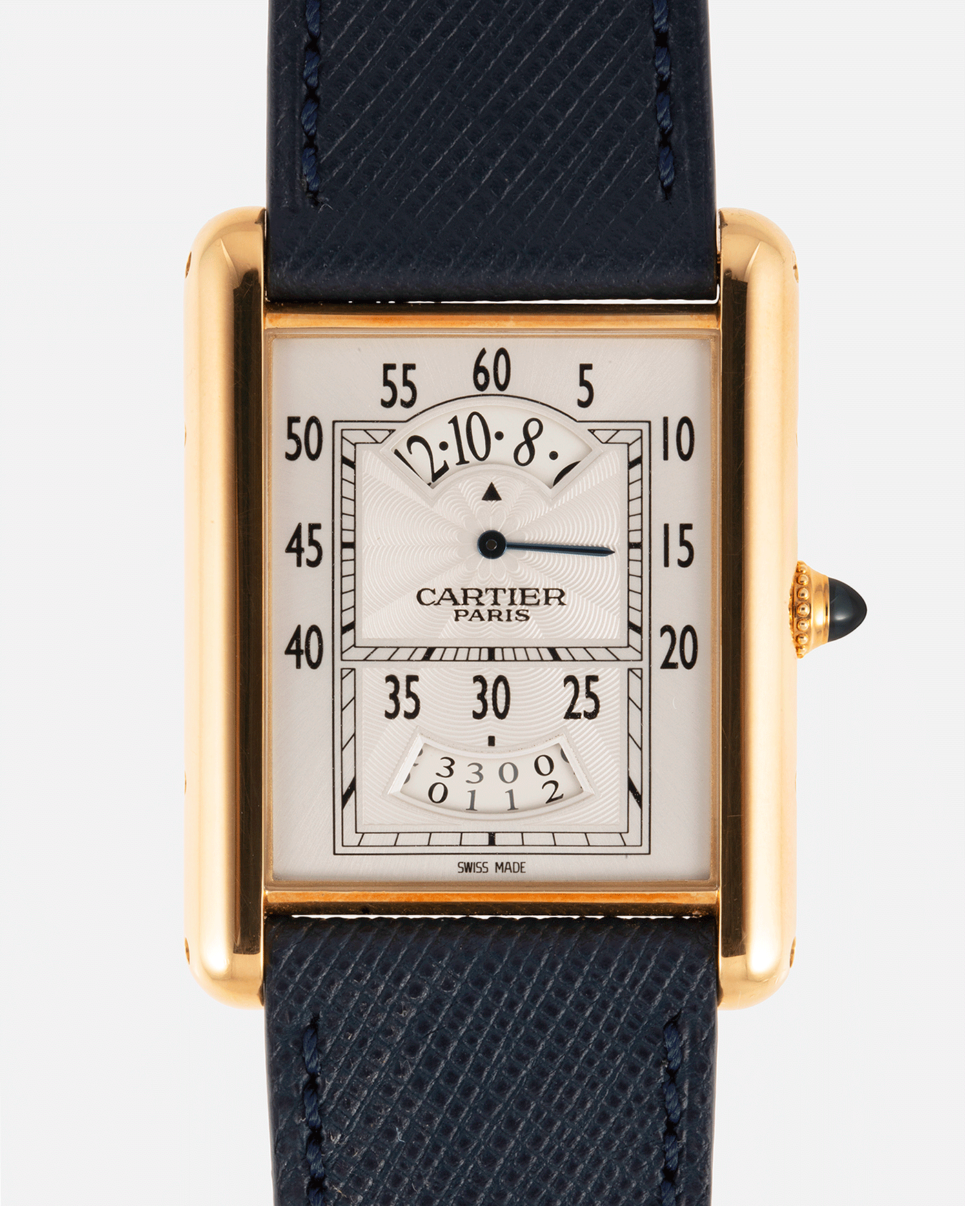 Brand: Cartier Year: 2005 Model: Collection Prive Tank Louis Cartier Wandering Hours Reference: 2918 Material: 18k Rose Gold Movement: Piaget-Based Manually Wound Cal. 9902 MC Case Diameter: 28mm width, 40.5mm lug to lug Strap: Navy Blue Molequin Textured Calf Strap with separate 18k Cartier Rose Gold Deployant