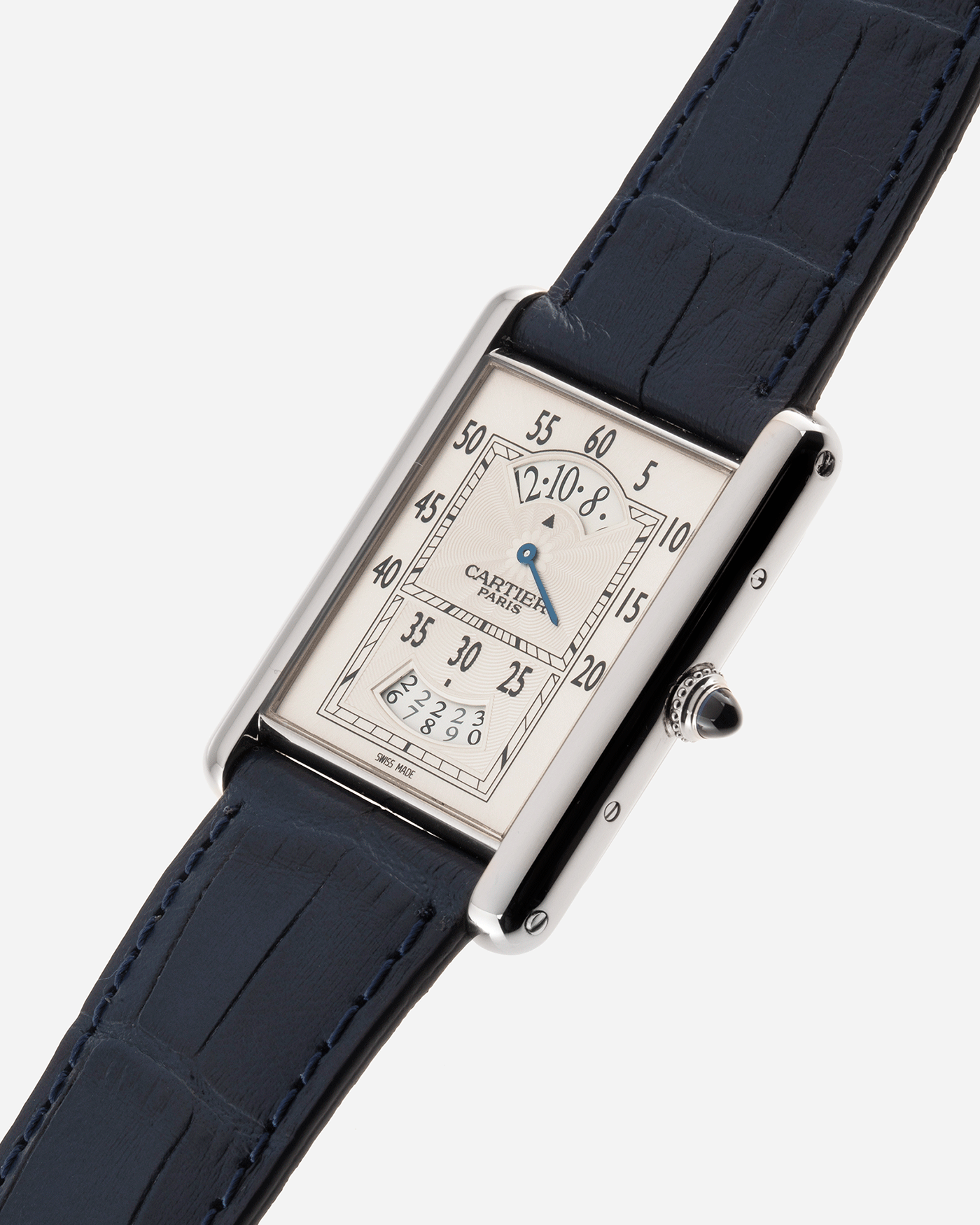 Brand: Cartier Year: 2000’s Model: Collection Prive Tank Louis Cartier Wandering Hours Reference: 2919 Material: 18k White Gold Movement: Piaget-Based Manually Wound Cal. 9902 MC Case Diameter: 28mm width, 40.5mm lug to lug Strap: Blue Cartier Alligator with 18k Cartier White Gold Deployant