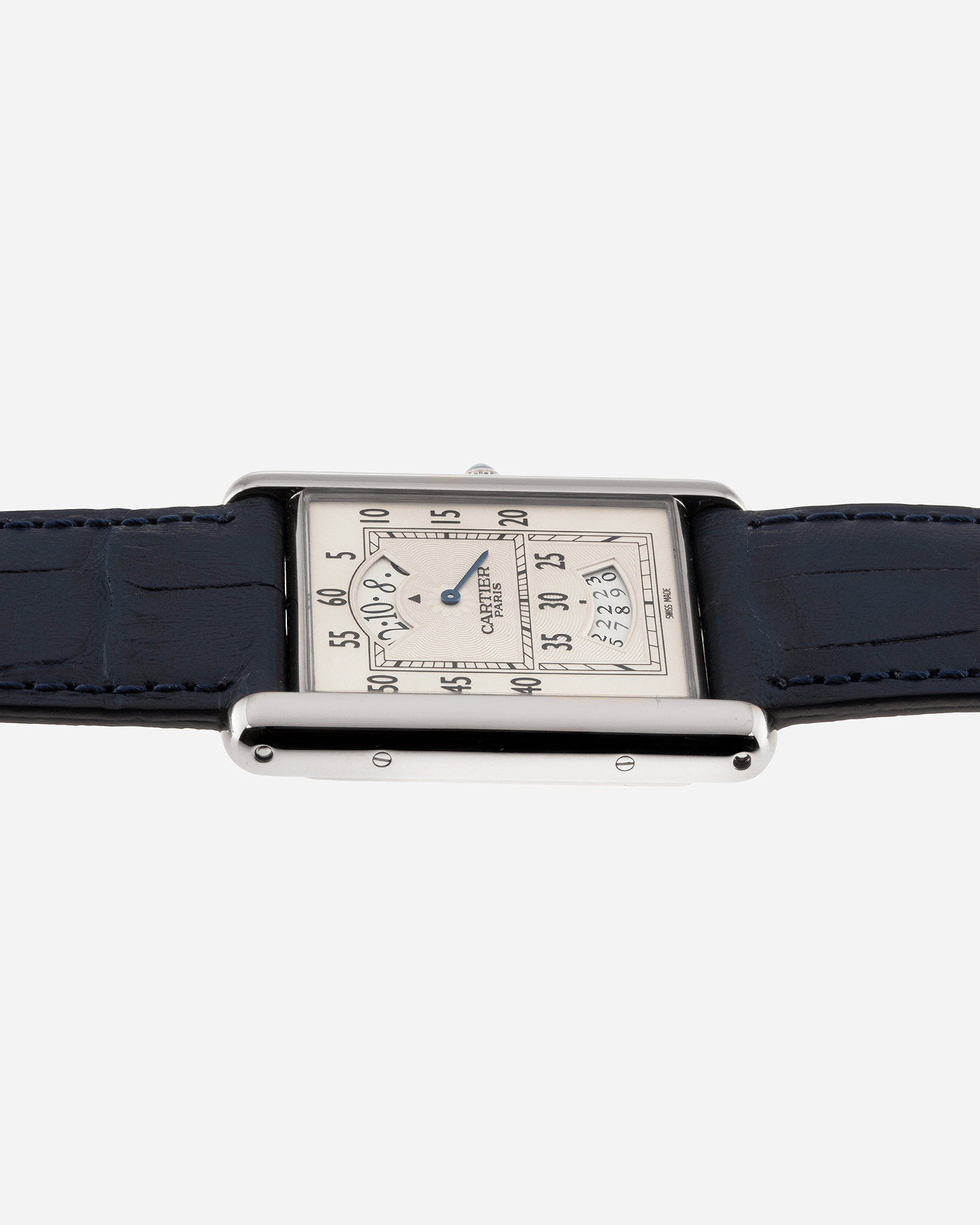 Brand: Cartier Year: 2000’s Model: Collection Prive Tank Louis Cartier Wandering Hours Reference: 2919 Material: 18k White Gold Movement: Piaget-Based Manually Wound Cal. 9902 MC Case Diameter: 28mm width, 40.5mm lug to lug Strap: Blue Cartier Alligator with 18k Cartier White Gold Deployant
