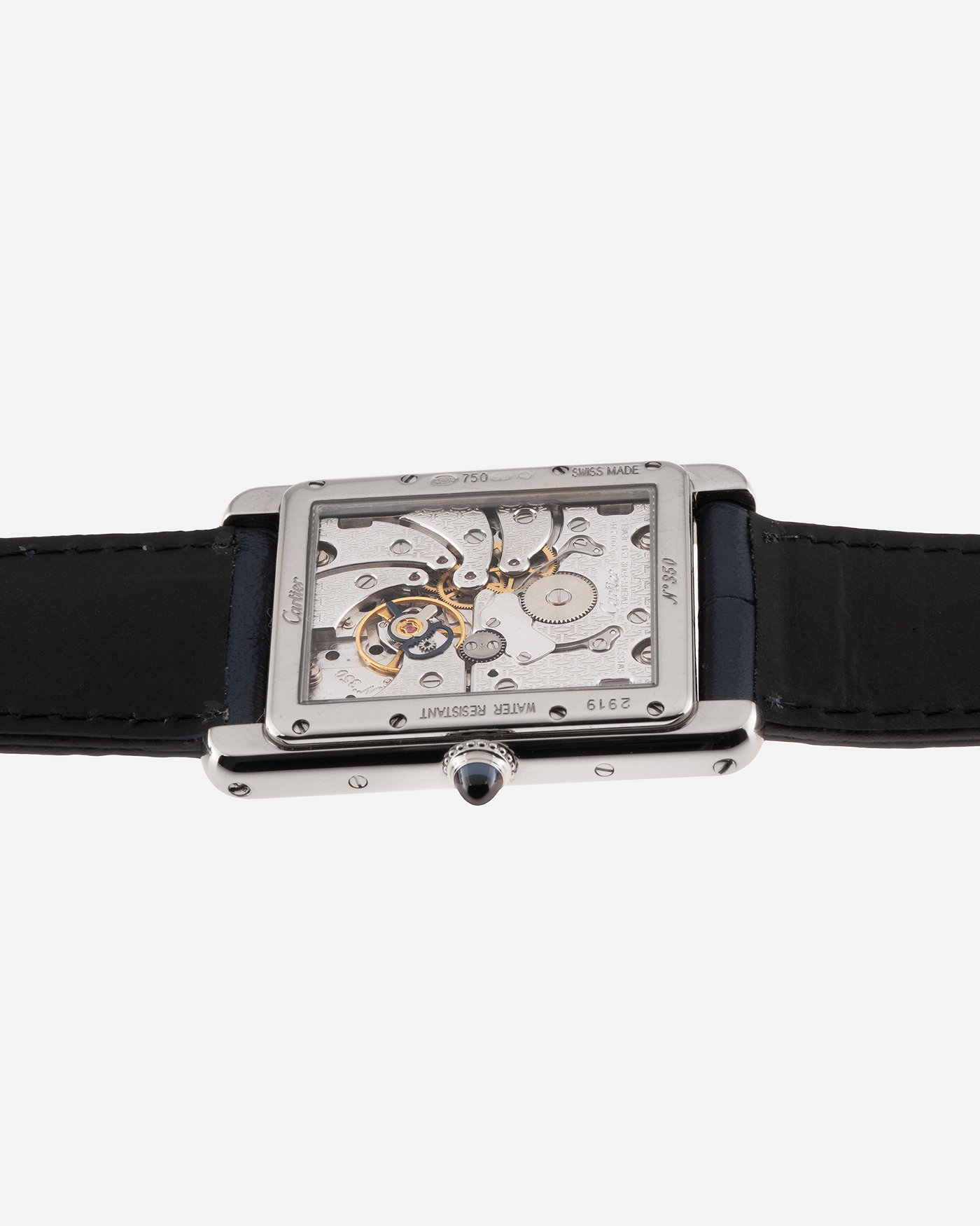 Brand: Cartier Year: 2000’s Model: Collection Prive Tank Louis Cartier Wandering Hours Reference: 2919 Material: 18k White Gold Movement: Piaget-Based Manually Wound Cal. 9902 MC Case Diameter: 28mm width, 40.5mm lug to lug Strap: Blue Cartier Alligator with 18k Cartier White Gold Deployant