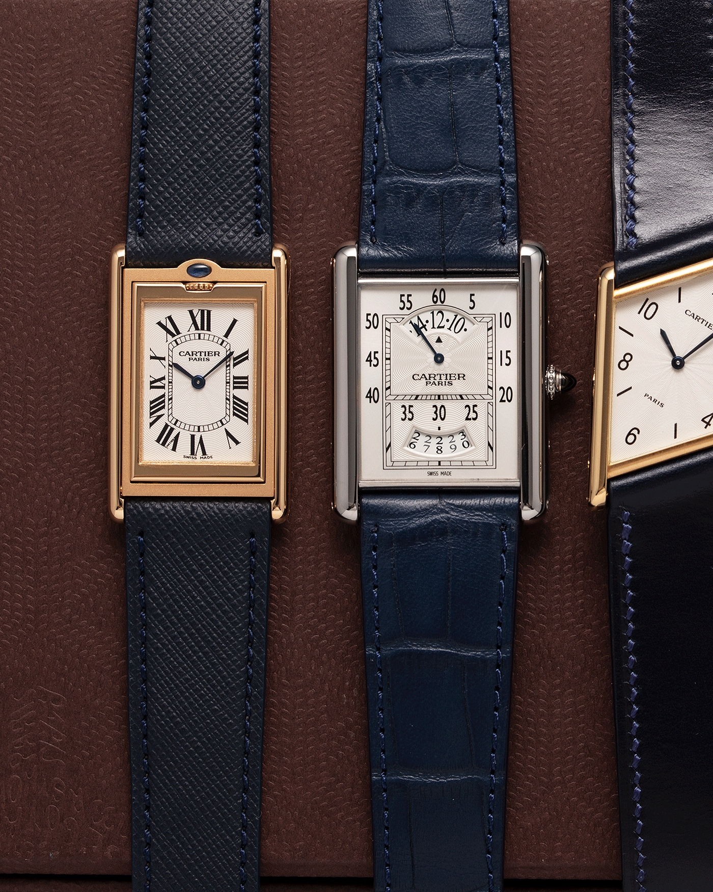 Brand: Cartier Year: 2000’s Model: Collection Prive Tank Louis Cartier Wandering Hours Reference: 2919 Material: 18k White Gold Movement: Piaget-Based Manually Wound Cal. 9902 MC Case Diameter: 28mm width, 40.5mm lug to lug Strap: Blue Cartier Alligator with 18k Cartier White Gold Deployant