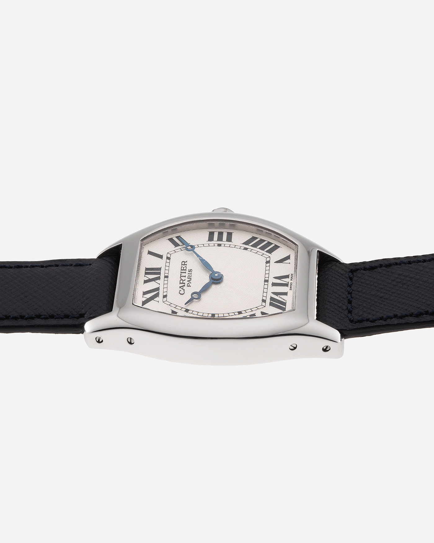 Brand: Cartier Year: 2000’s Model: CPCP Collection Prive Tortue Reference: 2518 Material: Platinum Movement: Cartier Jaeger LeCoultre 9601MC Case Diameter: 43 x 35 mm Strap: Navy Blue Molequin Textured Calf Strap with 18k White Gold Deployant