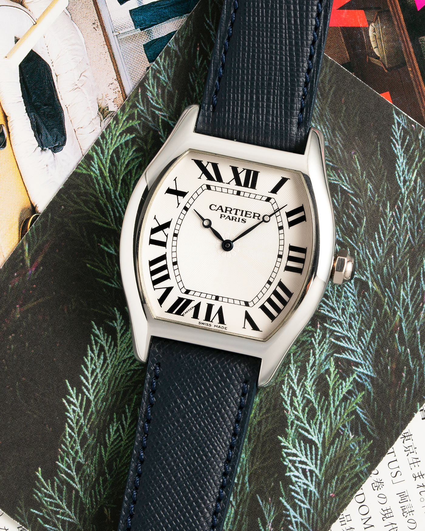 Brand: Cartier Year: 2011 Model: CPCP Collection Prive Tortue XL Reference: 2764 Material: Platinum Movement: Cartier Jaeger LeCoultre 9601MC Case Diameter: 48mm X 38mm including lugs Strap: Navy Blue Molequin Textured Calf Strap with 18k White Gold Deployant