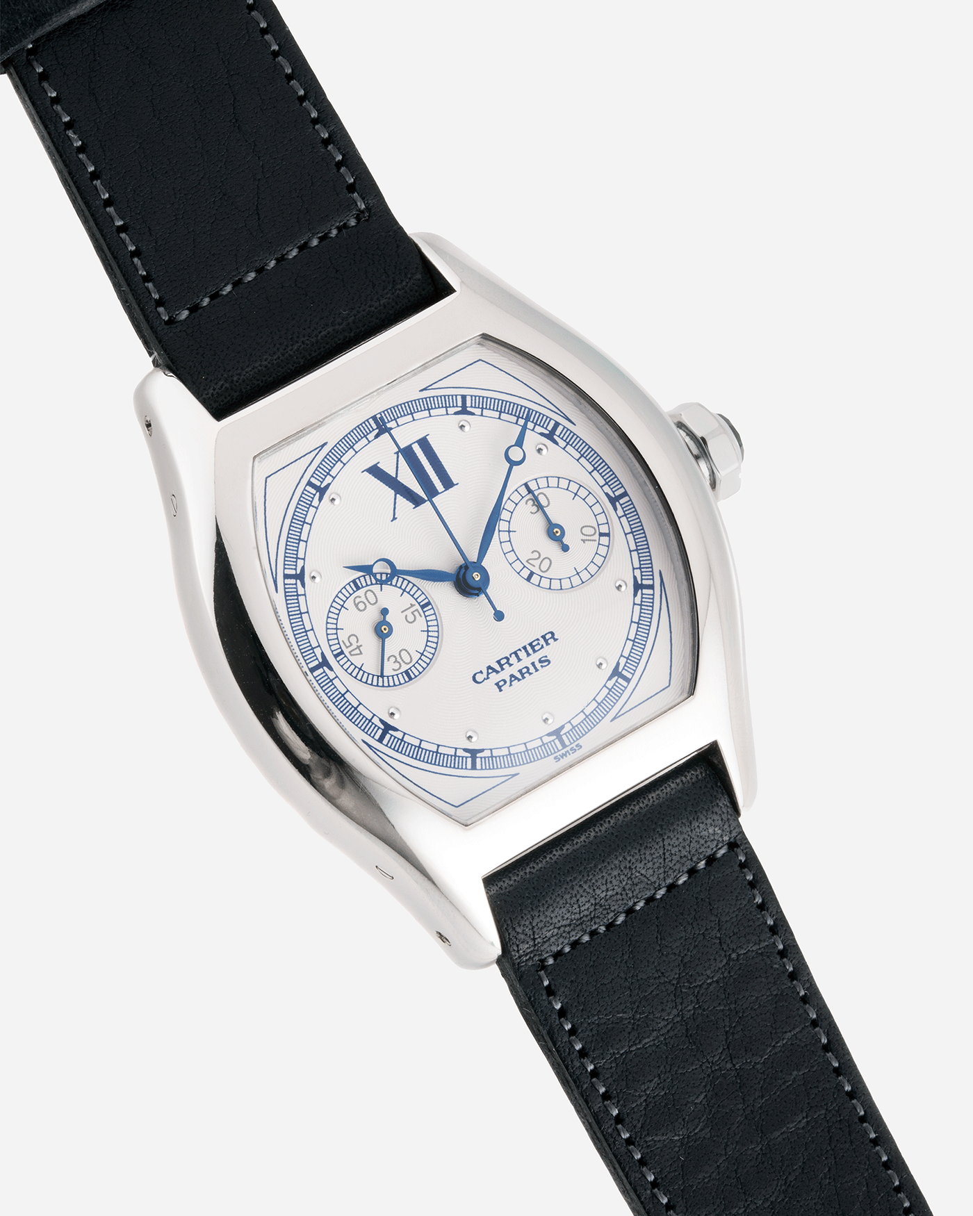 Brand: Cartier Year: 2000’s Model: CPCP Collection Prive Tortue Monopoussoir Reference: 2356 Material: 18k White Gold Movement: THA Cal. 045MC Case Diameter: 43 x 35 mm Strap: Navy Blue Accurate Form Japanese Calf Strap with separate 18k Cartier White Gold Deployant