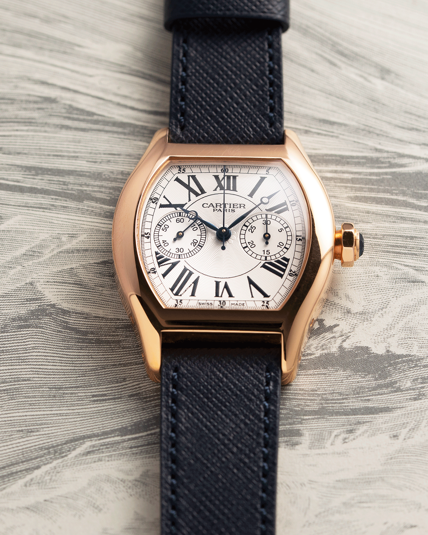 Brand: Cartier Year: 2000’s Model: CPCP Collection Prive Tortue Monopoussoir Reference: 2661 Material: 18k Rose Gold Movement: THA Cal. 045MC Case Diameter: 43 x 35 mm Strap: Navy Blue Molequin Textured Calf Strap with separate 18k Cartier Rose Gold Deployant
