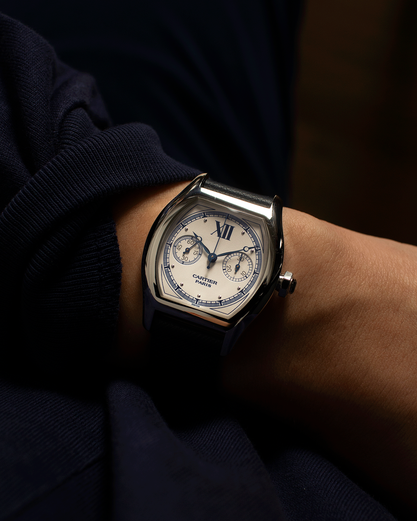 Brand: Cartier Year: 2000’s Model: CPCP Collection Prive Tortue Monopoussoir Reference: 2356 Material: 18k White Gold Movement: THA Cal. 045MC Case Diameter: 43 x 35 mm Strap: Navy Blue Molequin Textured Calf Strap with separate 18k Cartier White Gold Deployant