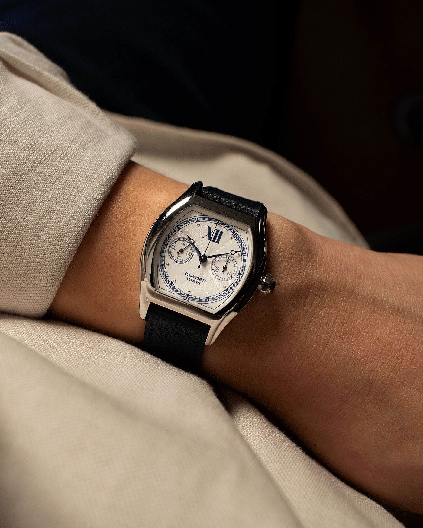 Brand: Cartier Year: 2000’s Model: CPCP Collection Prive Tortue Monopoussoir Reference: 2356 Material: 18k White Gold Movement: THA Cal. 045MC Case Diameter: 43 x 35 mm Strap: Navy Blue Molequin Textured Calf Strap with separate 18k Cartier White Gold Deployant