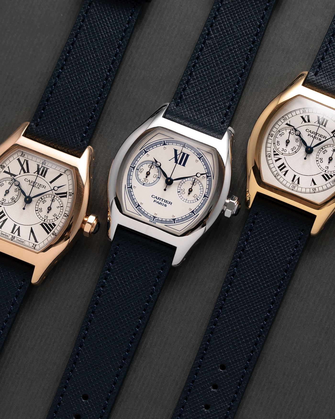 Brand: Cartier Year: 2000’s Model: CPCP Collection Prive Tortue Monopoussoir Reference: 2356 Material: 18k White Gold Movement: THA Cal. 045MC Case Diameter: 43 x 35 mm Strap: Navy Blue Molequin Textured Calf Strap with separate 18k Cartier White Gold Deployant