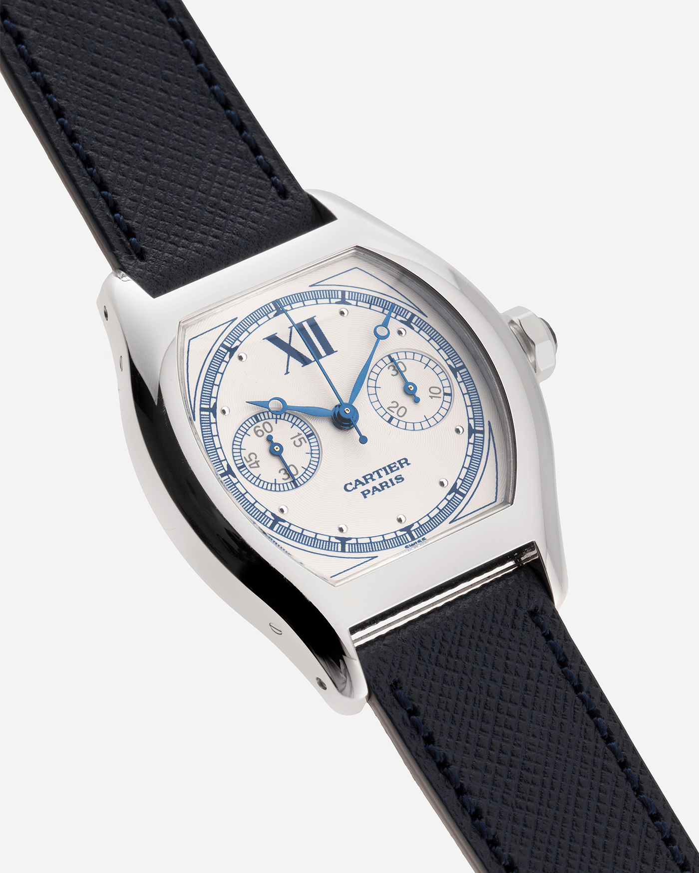 Brand: Cartier Year: 2000’s Model: CPCP Collection Prive Tortue Monopoussoir Reference: 2356 Material: 18k White Gold Movement: THA Cal. 045MC Case Diameter: 43 x 35 mm Strap: Navy Blue Molequin Textured Calf Strap with separate 18k Cartier White Gold Deployant