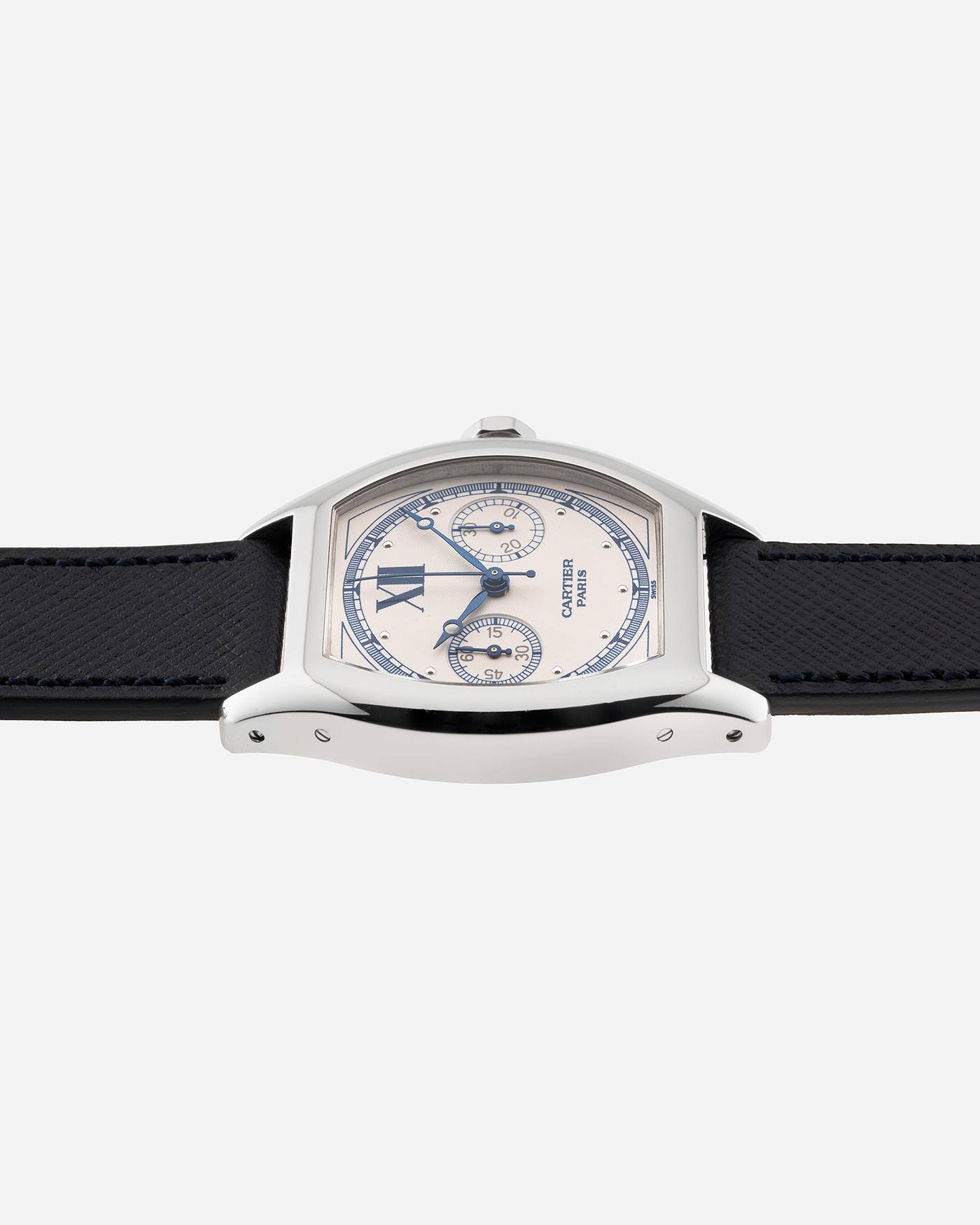 Brand: Cartier Year: 2000’s Model: CPCP Collection Prive Tortue Monopoussoir Reference: 2356 Material: 18k White Gold Movement: THA Cal. 045MC Case Diameter: 43 x 35 mm Strap: Navy Blue Molequin Textured Calf Strap with separate 18k Cartier White Gold Deployant