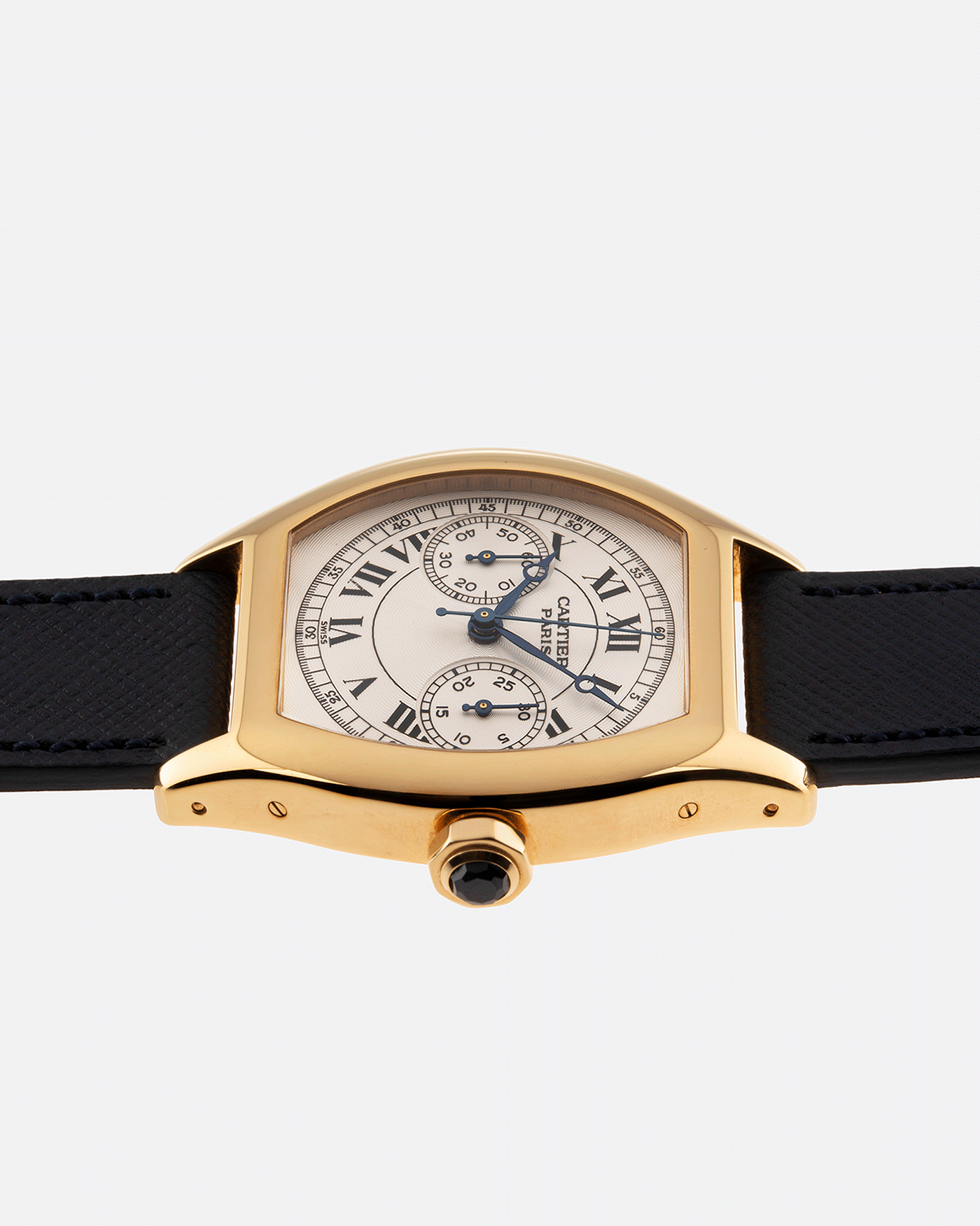 Brand: Cartier Year: 2000’s Model: CPCP Collection Prive Tortue Monopoussoir Reference: 2356E Material: 18k Yellow Gold Movement: THA Cal. 045MC Case Diameter: 43 x 35 mm Strap: Molequin Navy Blue Textured Calf with 18k Cartier Yellow Gold Deployant