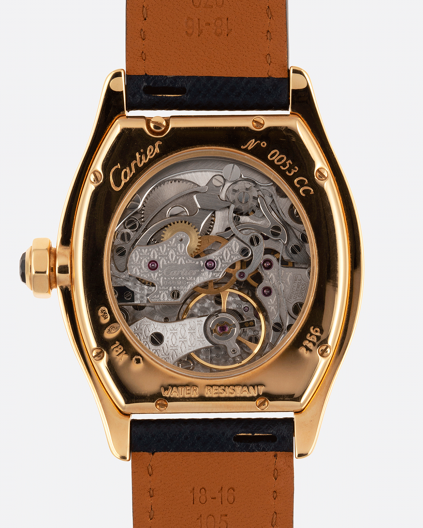 Brand: Cartier Year: 2000’s Model: CPCP Collection Prive Tortue Monopoussoir Reference: 2356E Material: 18k Yellow Gold Movement: THA Cal. 045MC Case Diameter: 43 x 35 mm Strap: Molequin Navy Blue Textured Calf with 18k Cartier Yellow Gold Deployant