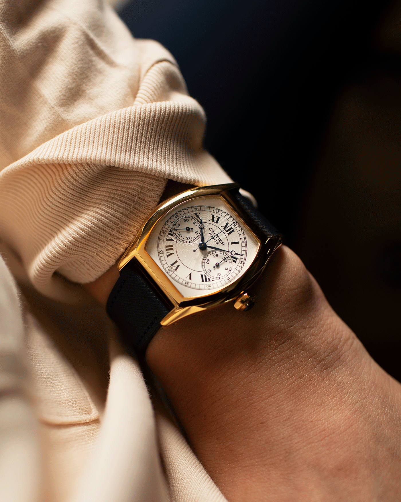 Brand: Cartier Year: 2000’s Model: CPCP Collection Prive Tortue Monopoussoir Reference: 2356E Material: 18k Yellow Gold Movement: THA Cal. 045MC Case Diameter: 43 x 35 mm Strap: Molequin Navy Blue Textured Calf with 18k Cartier Yellow Gold Deployant