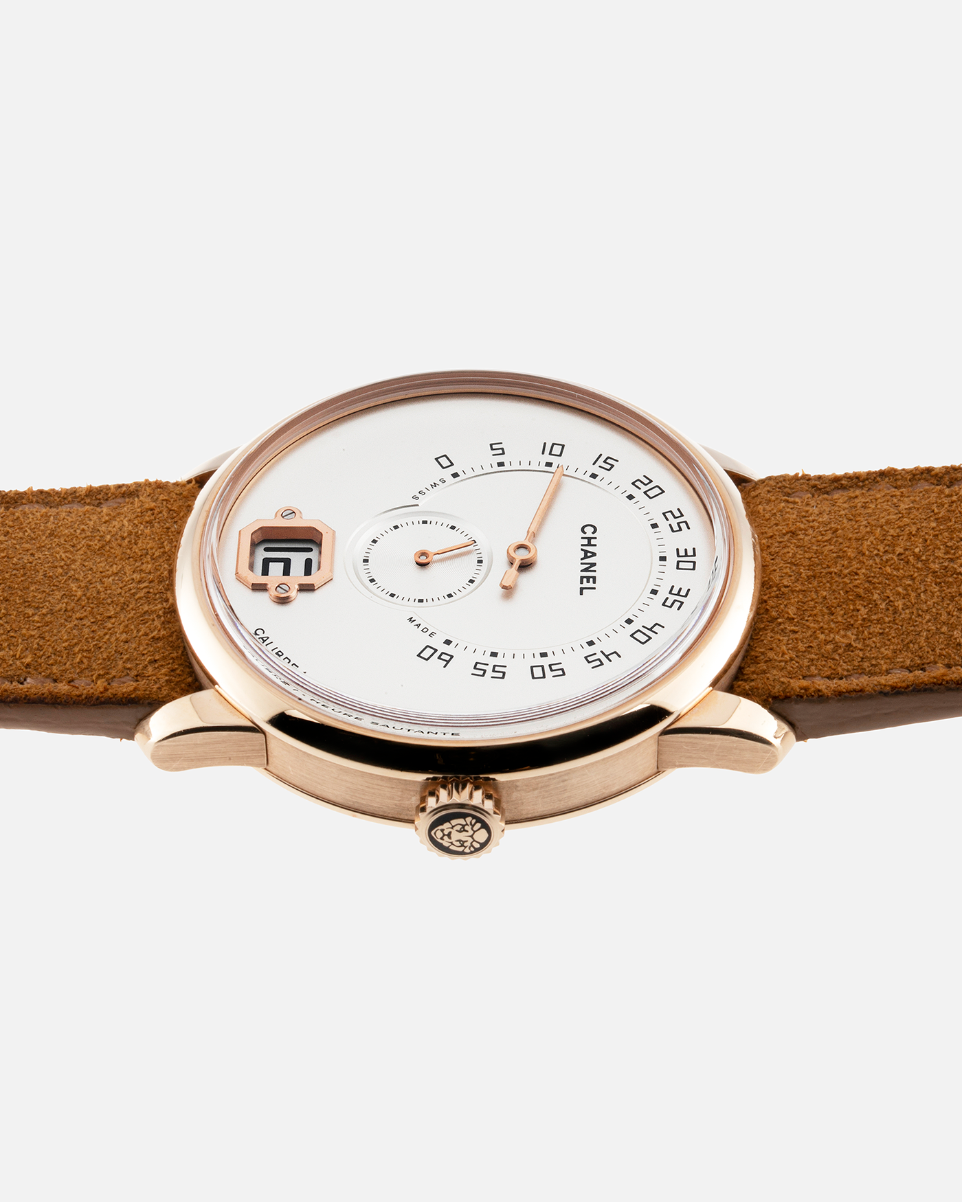 Brand: Chanel Year: 2016 Model: Monsieur De Chanel Jump Hour H6596 Material: 18-carat Beige Gold Movement: In-house Chanel Cal. 1, Manual-Winding  Case Diameter: 40mm Bracelet/Strap: Tanned Suede Strap from Rios 1931 with 18-carat Beige Gold Signed Deployant Clasp