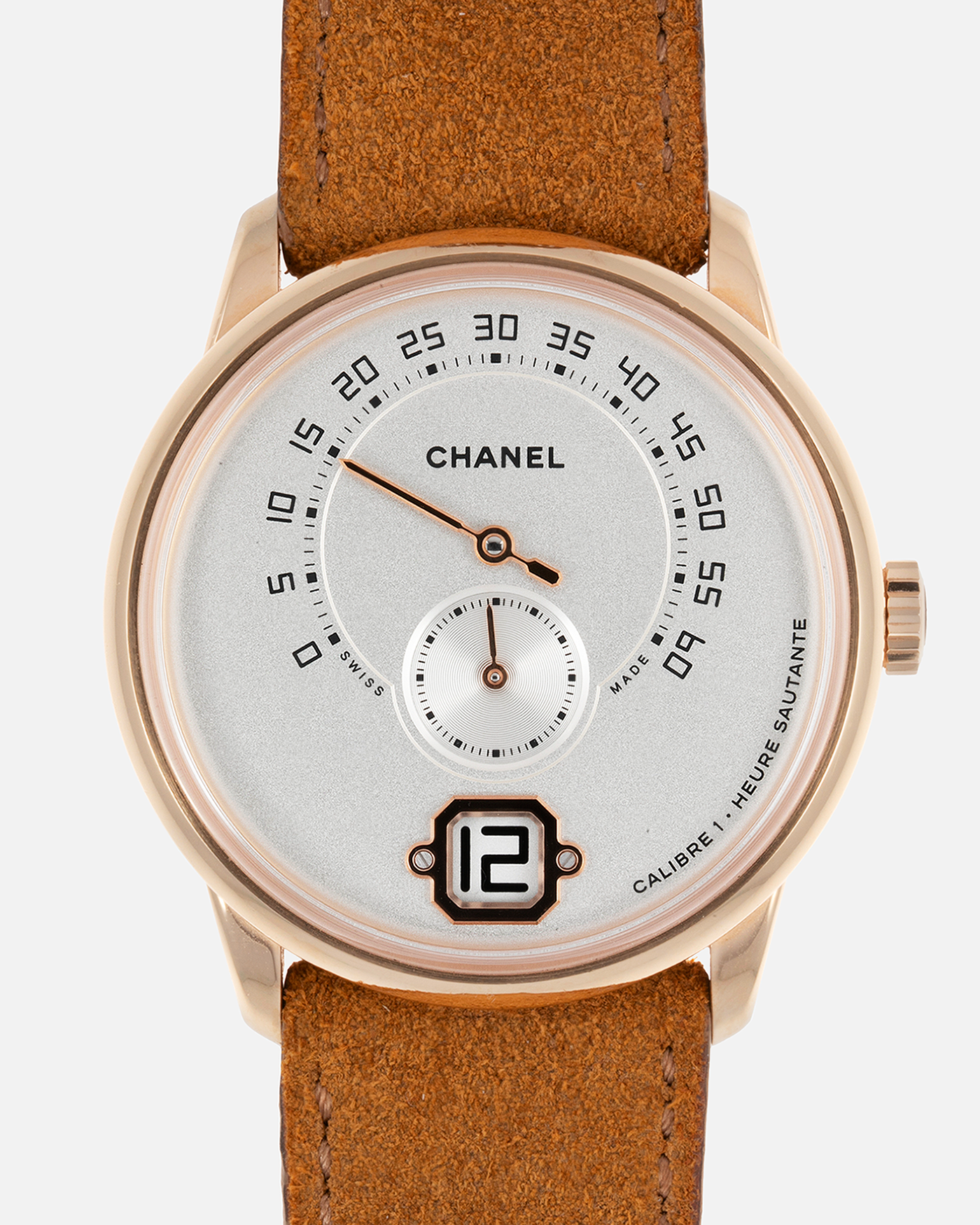 Brand: Chanel Year: 2016 Model: Monsieur De Chanel Jump Hour H6596 Material: 18-carat Beige Gold Movement: In-house Chanel Cal. 1, Manual-Winding  Case Diameter: 40mm Bracelet/Strap: Tanned Suede Strap from Rios 1931 with 18-carat Beige Gold Signed Deployant Clasp