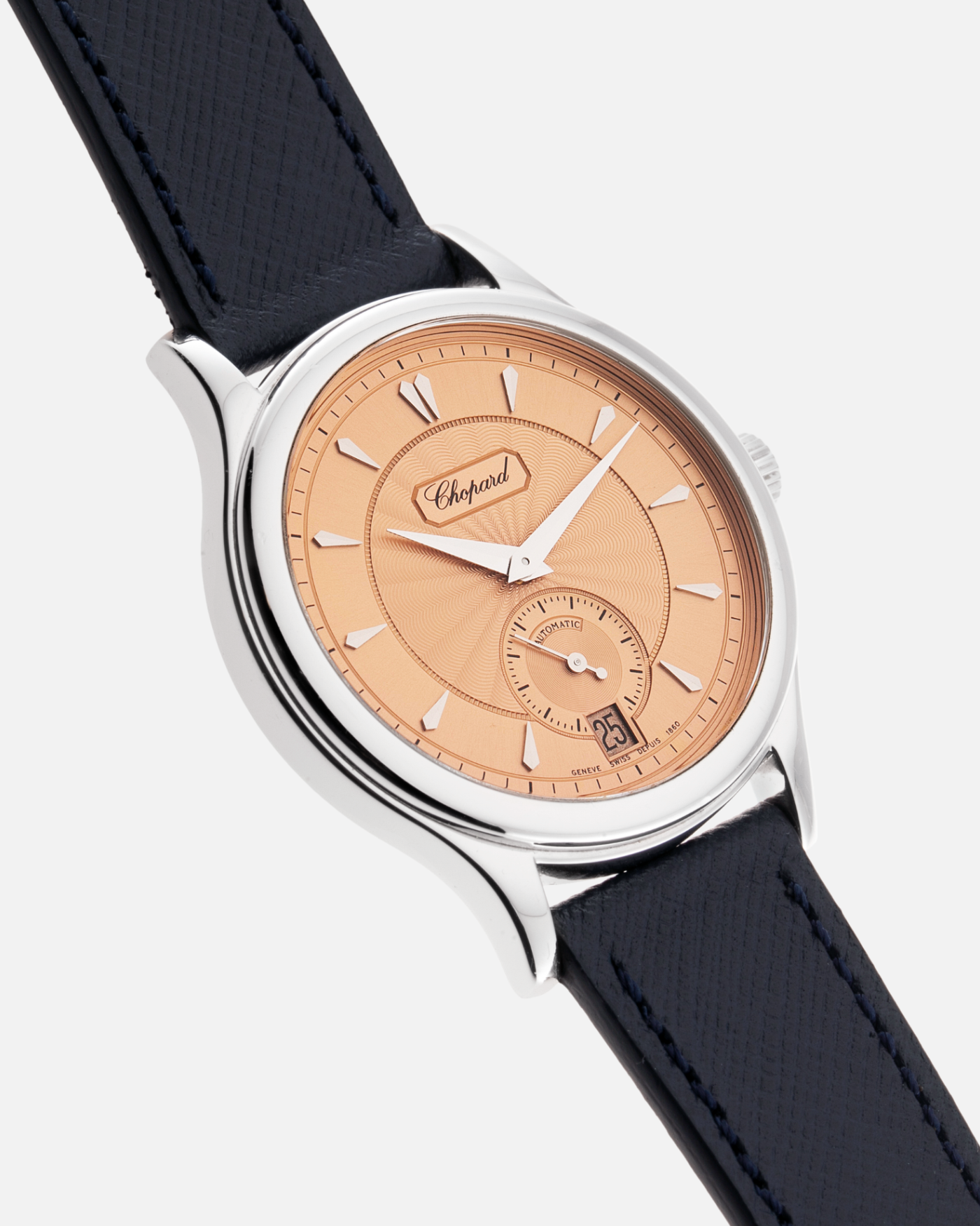Brand: Chopard L.U.C. Year: 1990’s Model: 16/1860/2 Material: 18k White Gold Movement: In-House Caliber 1.96 Case Diameter: 37mm Strap: Navy Blue Molequin Textured Calf and Brown Chopard Alligator Strap and 18k White Gold Chopard Tang Buckle