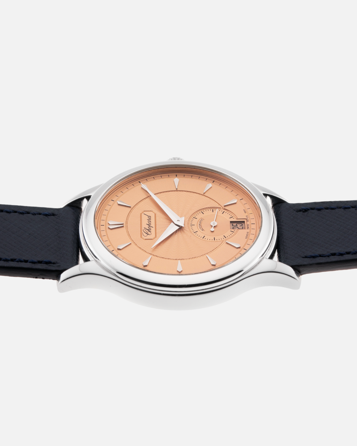 Brand: Chopard L.U.C. Year: 1990’s Model: 16/1860/2 Material: 18k White Gold Movement: In-House Caliber 1.96 Case Diameter: 37mm Strap: Navy Blue Molequin Textured Calf and Brown Chopard Alligator Strap and 18k White Gold Chopard Tang Buckle