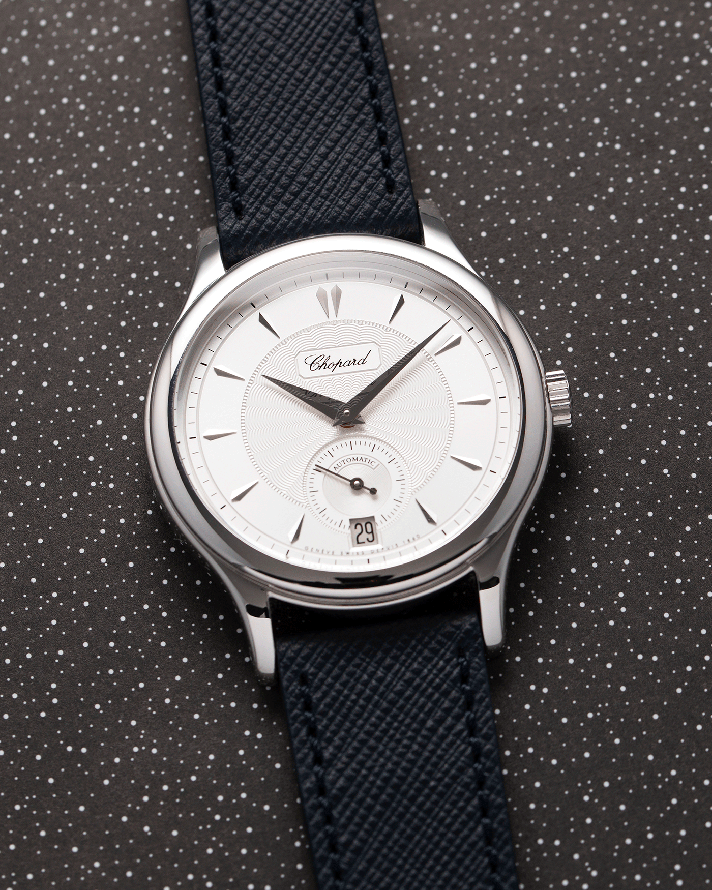 Brand: Chopard L.U.C. Year: 2000’s Model: 16/1860/4 Material: 18k White Gold Movement: In-House Caliber 1.96 Case Diameter: 37mm Strap: Navy Blue Molequin Textured Calf and Brown Chopard Alligator Strap and 18k White Gold Chopard Tang Buckle