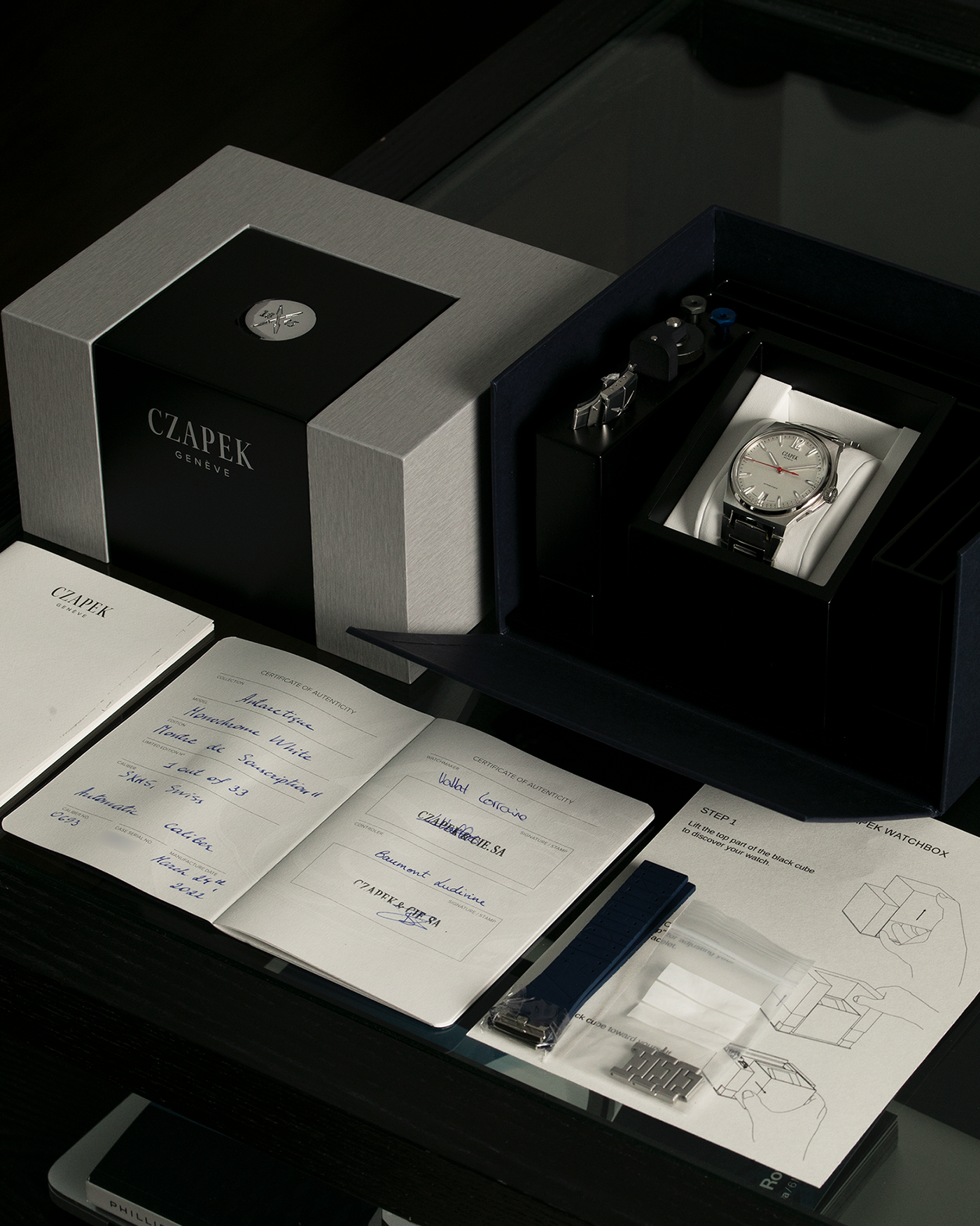 Brand: Czapek  Year: 2021 Model: Antarctique “Monochrome White”, Limited Edition of 33 pieces Material: Stainless Steel Movement: Cal. SXH5, Self-Winding, Platinum Micro-Rotor Case Diameter: 40.5mm Strap: Czapek Integrated Stainless Steel Bracelet with Signed Deployant Clasp and Micro-adjust Mechanism, additional Blue Czapek Rubber Strap with Signed Stainless Steel Deployant Clasp