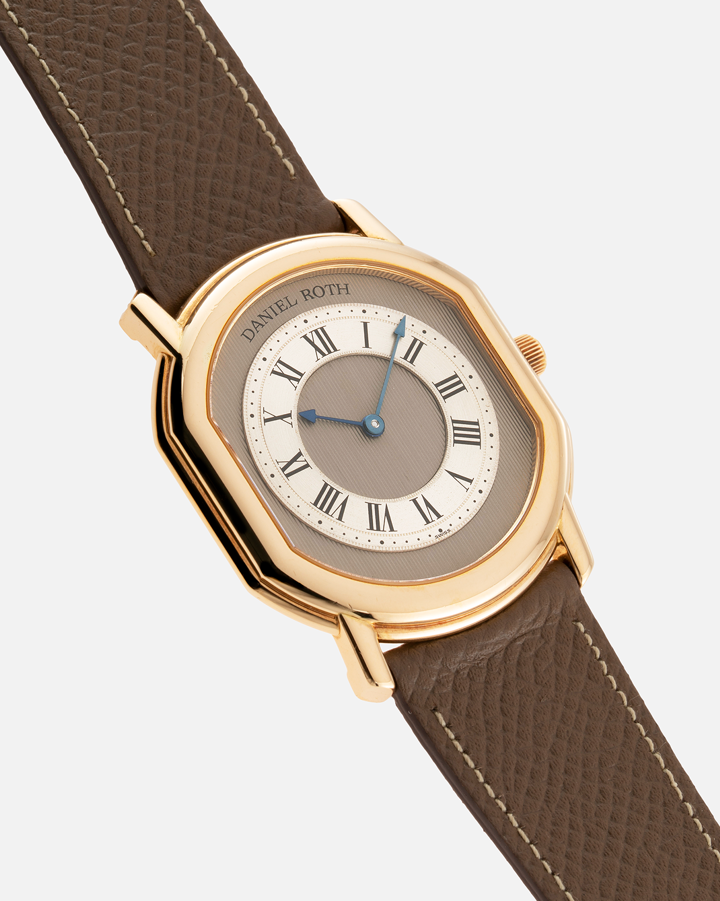 Brand: Daniel Roth Year: 1990’s Model: 2107 Material: 18k Yellow Gold Movement: Frederic Piguet Cal. 71 Case Diameter: 35mm X 38mm Strap: Nostime Taupe Grained Calf with 18k Yellow Gold Tang Buckle