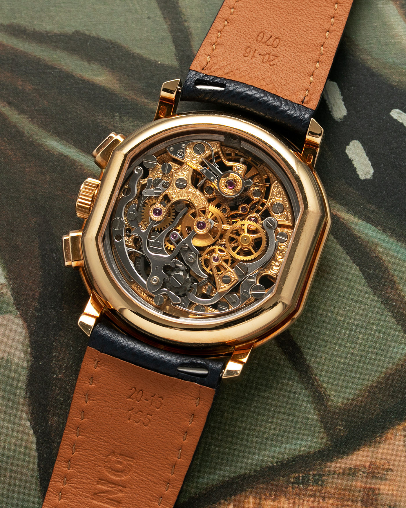 Brand: Daniel Roth Year: 1990’s Model: 2147 Skeleton Material: 18k Yellow Gold Movement: Lemania 2320 Case Diameter: 35mm X 38mm Strap: Molequin Navy Blue Textured Calf Strap and 18k Yellow Gold Daniel Roth Tang Buckle