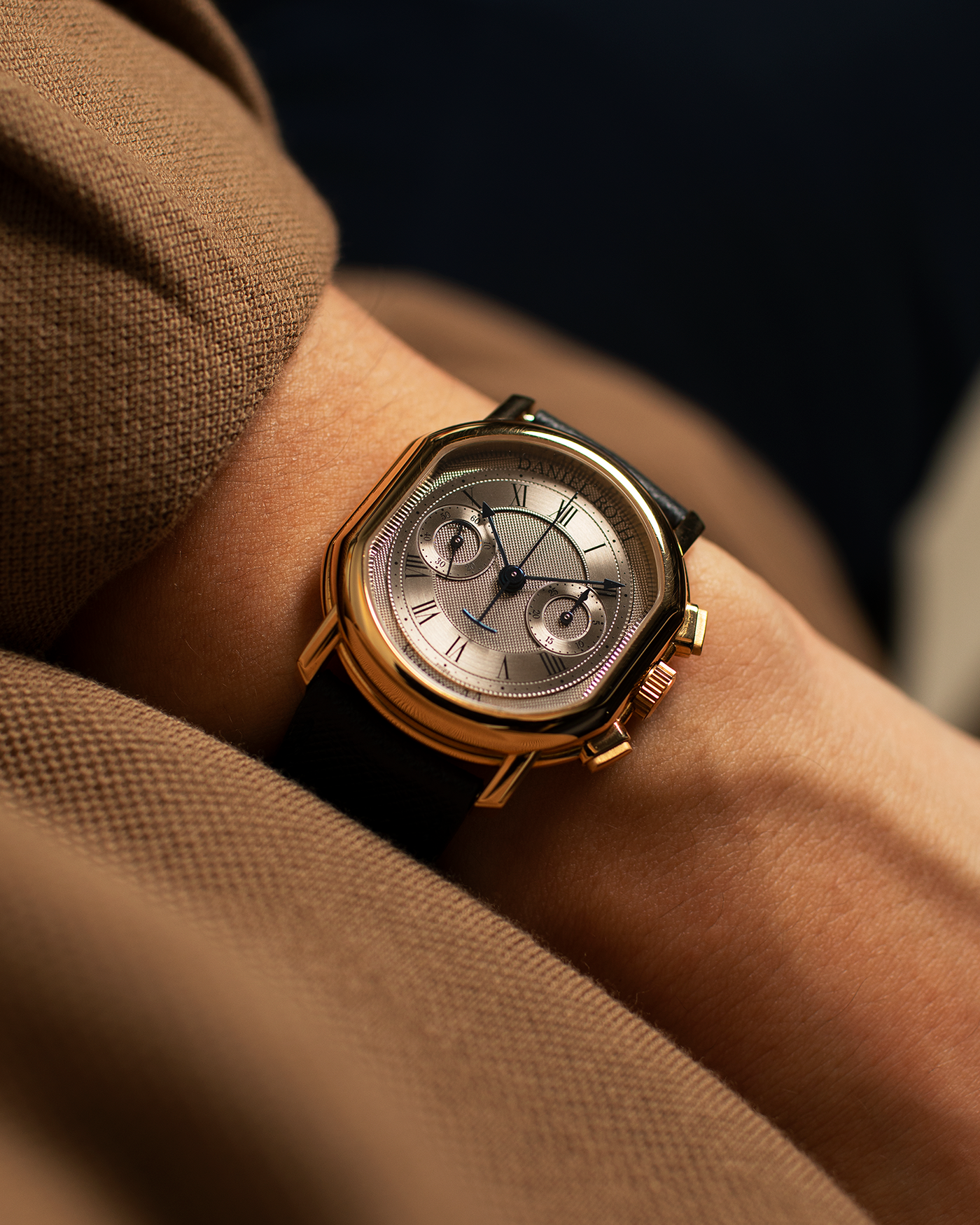 Brand: Daniel Roth Year: 1990’s Model: C147 Material: 18k Yellow Gold Movement: Lemania 2320 Case Diameter: 35mm X 38mm Strap: Molequin Navy Blue Textured Calf Strap and 18k Yellow Gold Daniel Roth Tang Buckle
