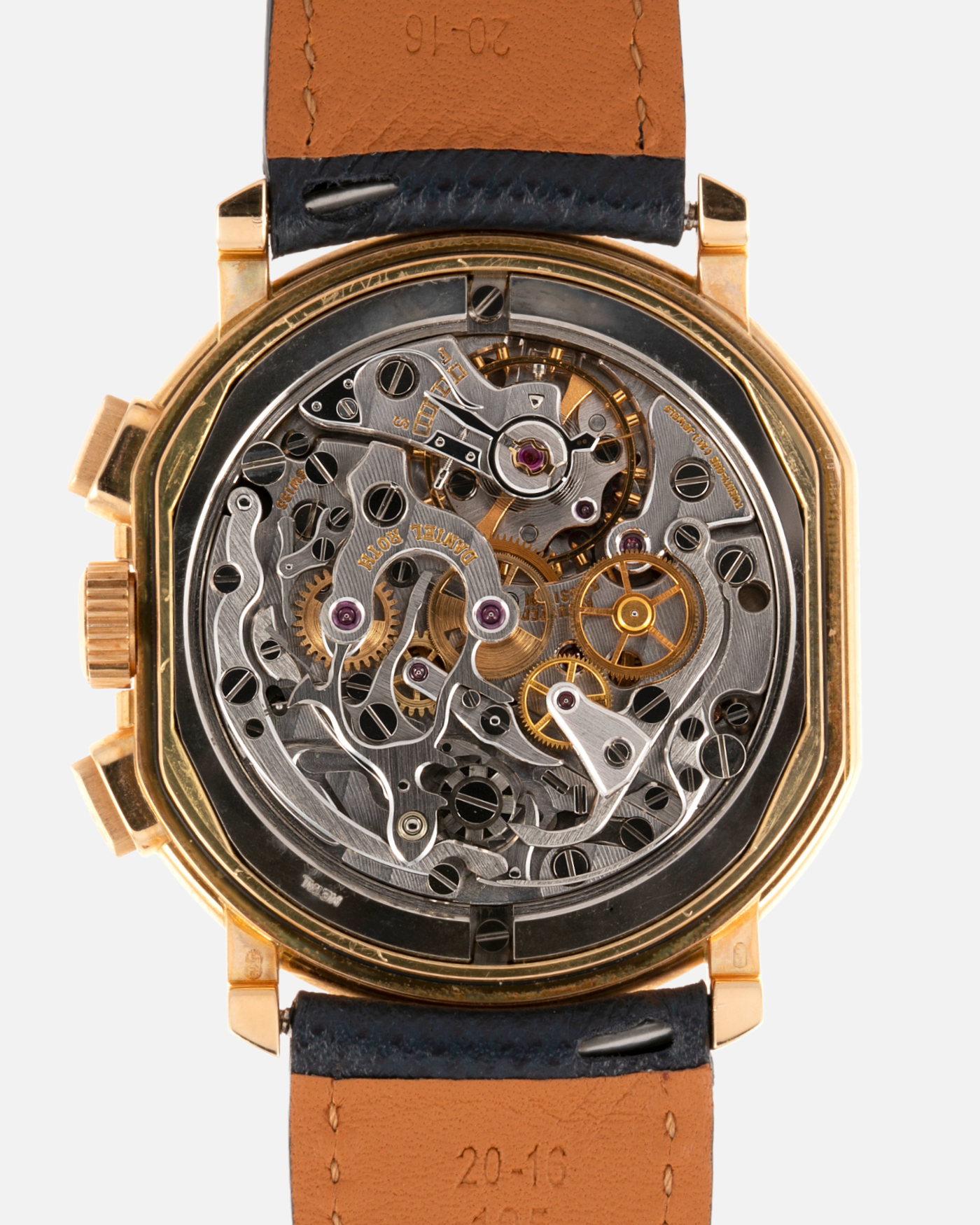 Brand: Daniel Roth Year: 1990’s Model: C147 Material: 18k Yellow Gold Movement: Lemania 2320 Case Diameter: 35mm X 38mm Strap: Molequin Navy Blue Textured Calf Strap and 18k Yellow Gold Daniel Roth Tang Buckle