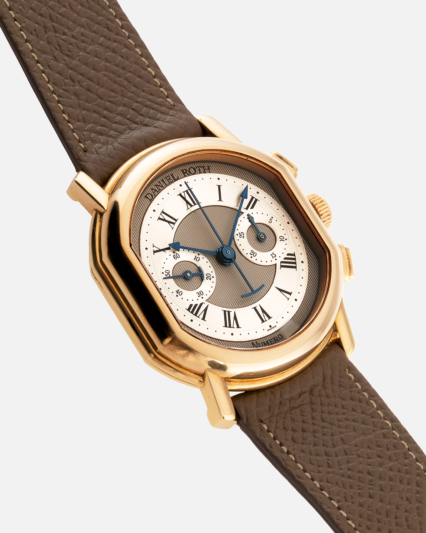 Brand: Daniel Roth Year: 1990’s Model: 2147 Material: 18k Yellow Gold Movement: Lemania 2320 Case Diameter: 35mm X 38mm Strap: Nostime Taupe Texture Calf and 18k Yellow Gold Daniel Roth Tang Buckle