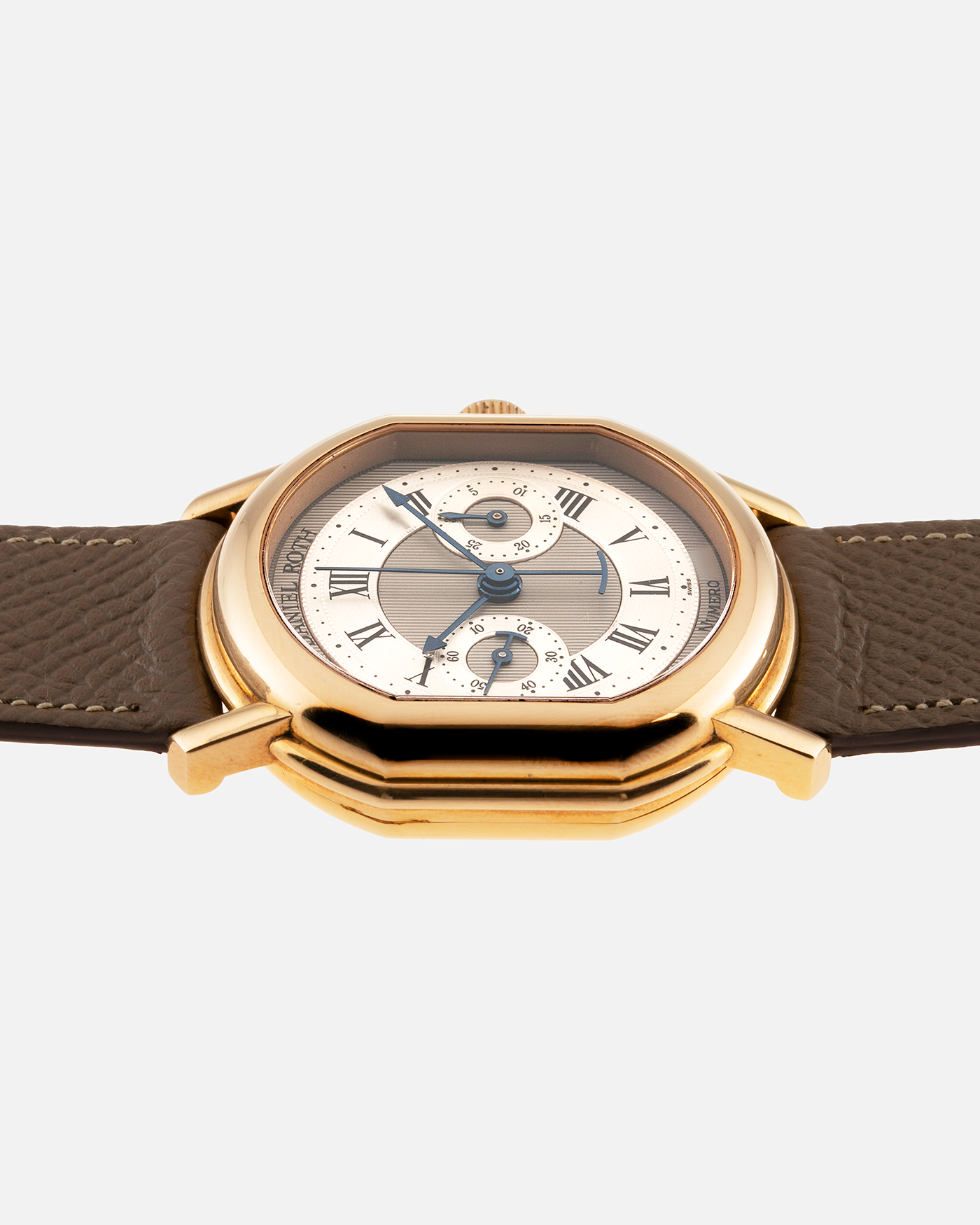 Brand: Daniel Roth Year: 1990’s Model: 2147 Material: 18k Yellow Gold Movement: Lemania 2320 Case Diameter: 35mm X 38mm Strap: Nostime Taupe Texture Calf and 18k Yellow Gold Daniel Roth Tang Buckle