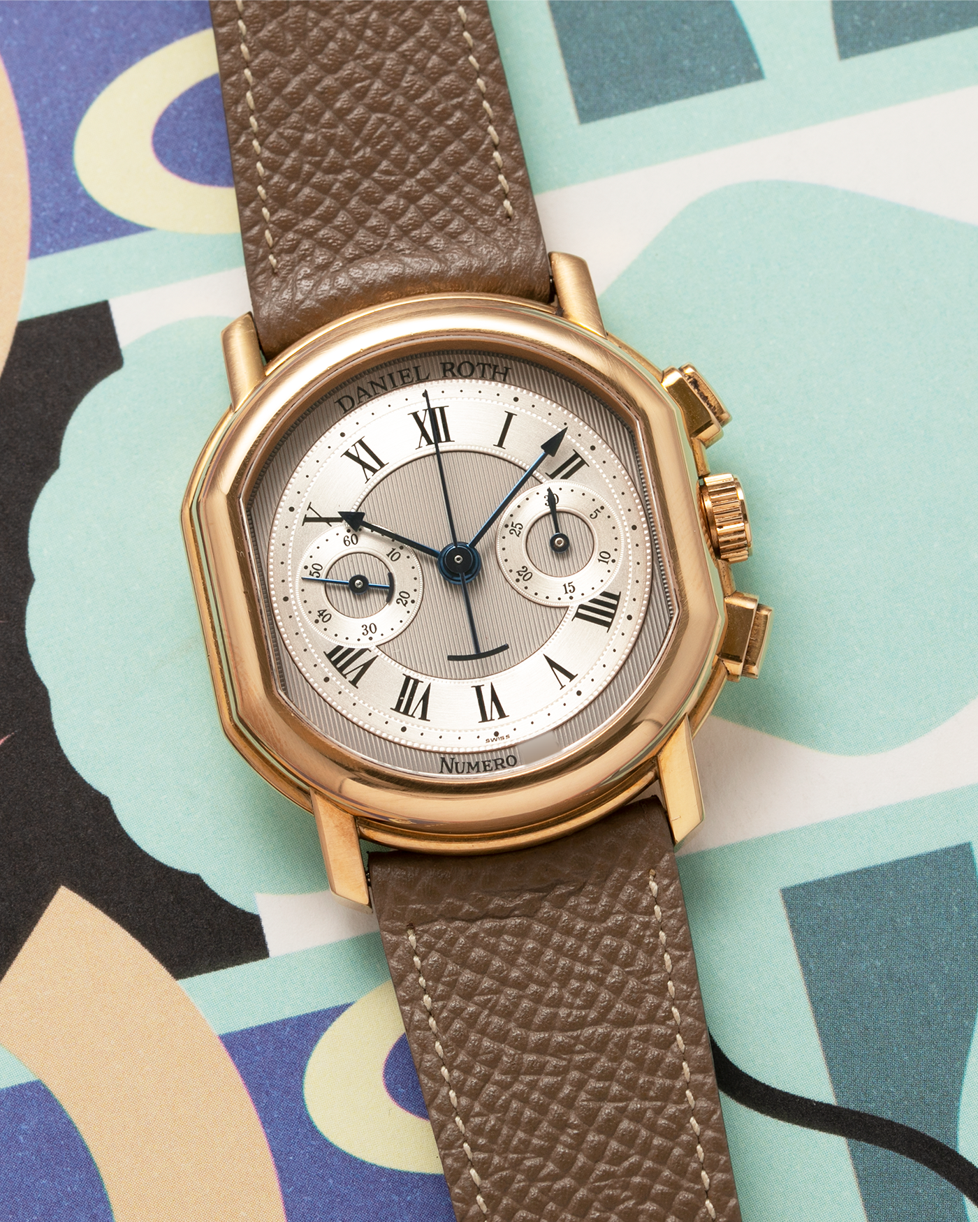 Brand: Daniel Roth Year: 1990’s Model: 2147 Material: 18k Yellow Gold Movement: Lemania 2320 Case Diameter: 35mm X 38mm Strap: Nostime Taupe Texture Calf and 18k Yellow Gold Daniel Roth Tang Buckle