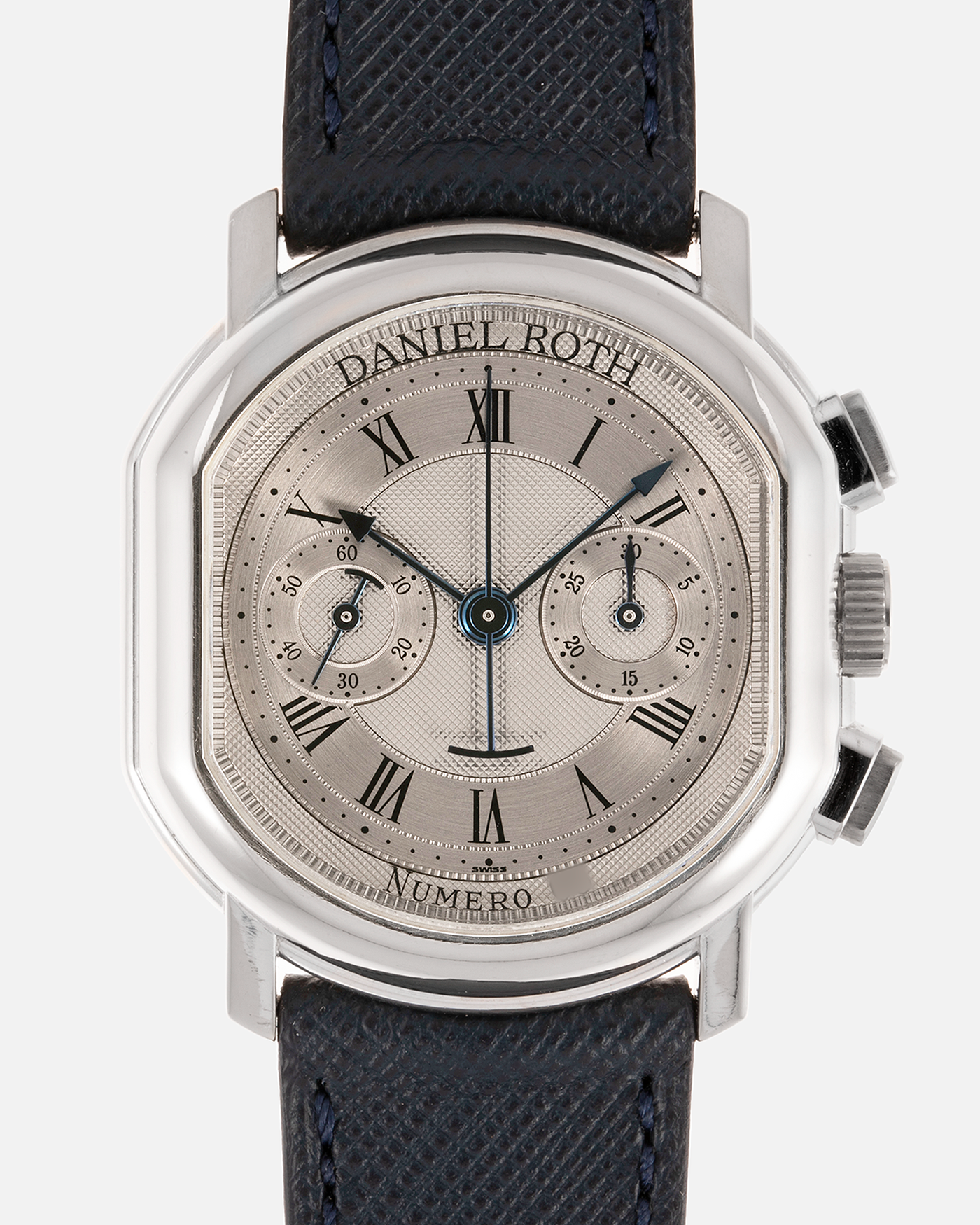 Brand: Daniel Roth Year: 1990’s Model: 2147 Material: 18k White Gold Movement: Lemania 2320 Case Diameter: 35mm X 38mm Strap: Molequin Navy Blue Textured Calf Strap and 18k White Gold Daniel Roth Tang Buckle