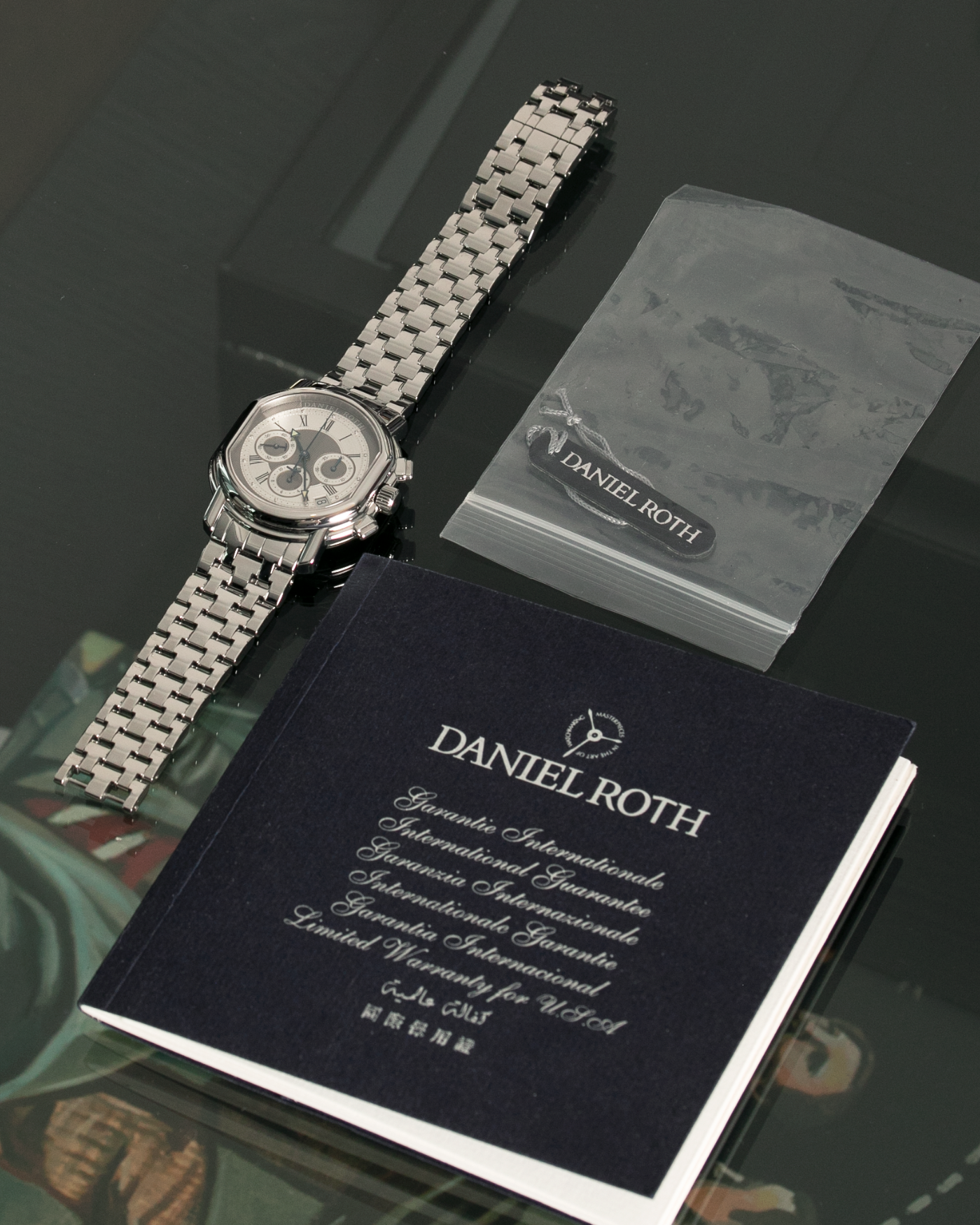 Brand: Daniel Roth Year: 1990’s Model: Masters Chronograph Material: Stainless Steel Movement: Zenith El Primero 400 Case Diameter: 38.5X41.5mm Bracelet/Strap: Molequin Navy Calf with 18k Yellow Gold Daniel Roth Tang Buckle