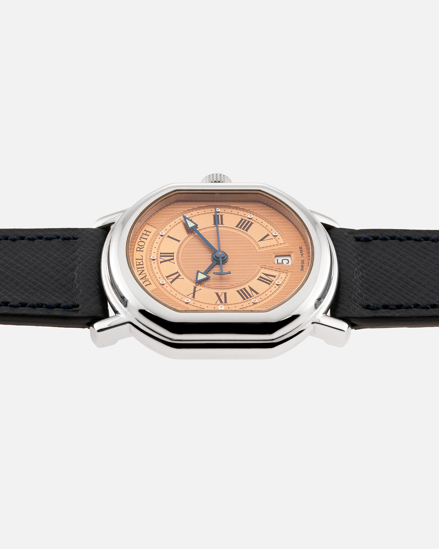Brand: Daniel Roth Year: 1990’s Model: Le Sentier Material: Stainless Steel Movement: Frederic Piguet Cal. 9.51 Case Diameter: 36mm X 31mm Strap: Molequin Navy Blue Textured Calf Strap and Stainless Steel Daniel Roth Tang Buckle