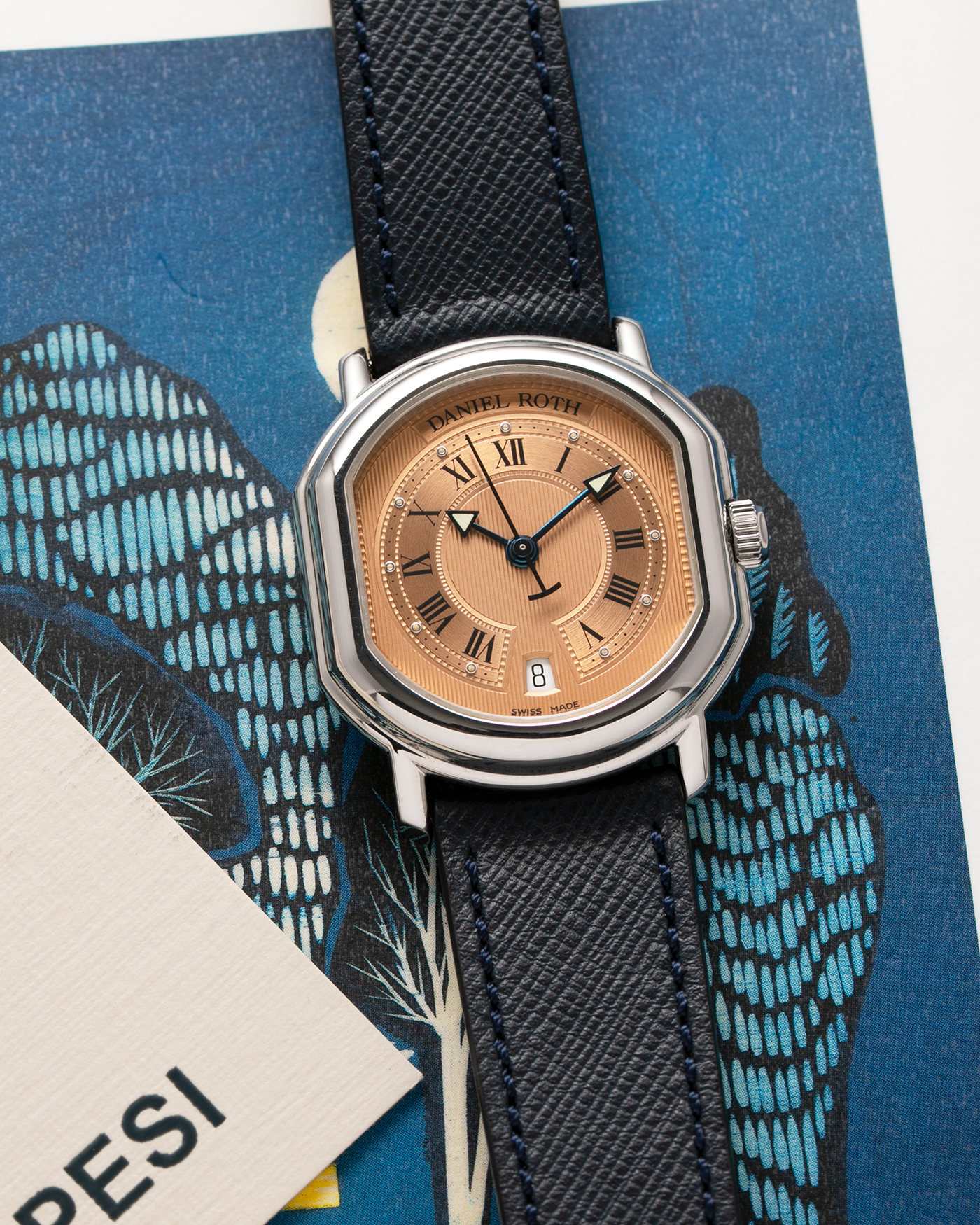 Brand: Daniel Roth Year: 1990’s Model: Le Sentier Material: Stainless Steel Movement: Frederic Piguet Cal. 9.51 Case Diameter: 36mm X 31mm Strap: Molequin Navy Blue Textured Calf Strap and Stainless Steel Daniel Roth Tang Buckle