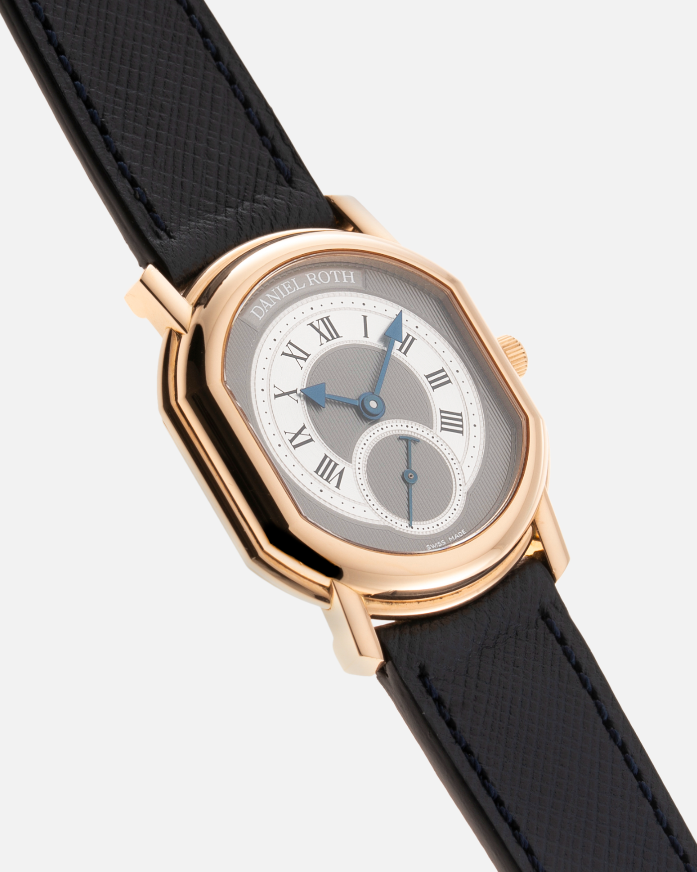 Brand: Daniel Roth Year: 1990’s Model: Seconds at Six Material: 18k Yellow Gold  Movement: Girard Perregaux 3100 Case Diameter: 35mmX32mm Bracelet/Strap: Molequin Navy Calf with 18k Yellow Gold Daniel Roth Tang Buckle