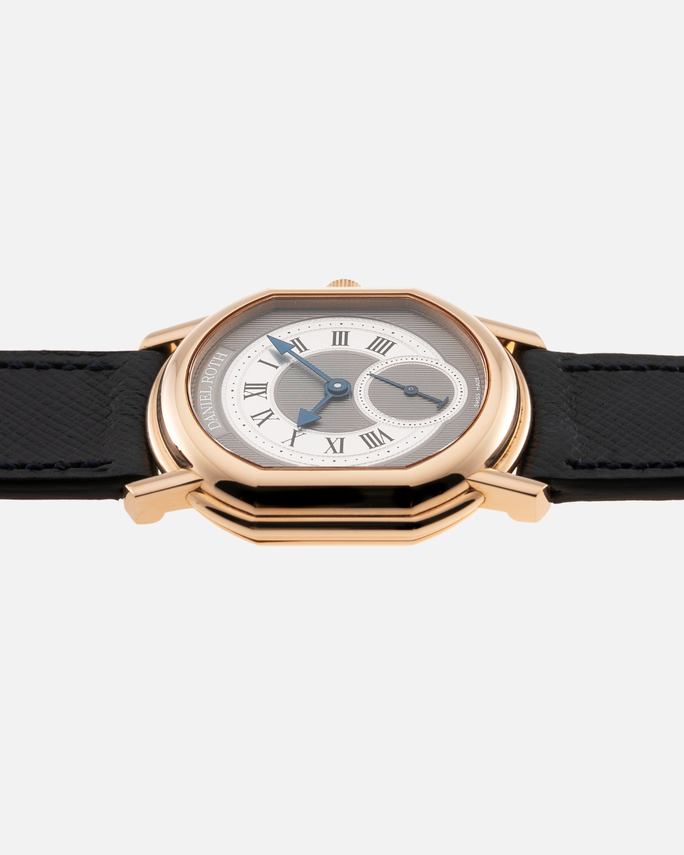 Brand: Daniel Roth Year: 1990’s Model: Seconds at Six Material: 18k Yellow Gold  Movement: Girard Perregaux 3100 Case Diameter: 35mmX32mm Bracelet/Strap: Molequin Navy Calf with 18k Yellow Gold Daniel Roth Tang Buckle