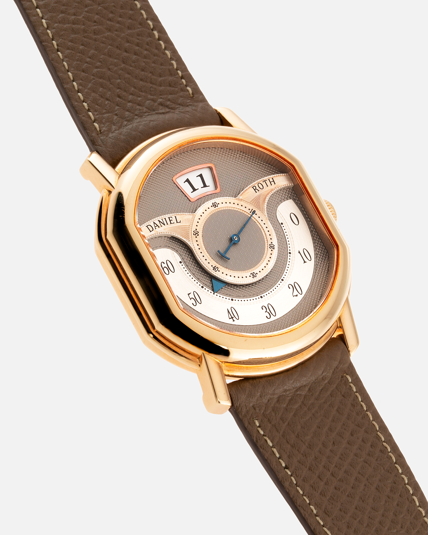 Brand: Daniel Roth Year: 1999 Model: 10th Anniversary Papillon Material: 18k Rose Gold Movement: Daniel Roth Calibre DR113 Case Diameter: 35mm X 41mm X 11mm Bracelet/Strap: Nostime Taupe Textured Calf Strap with 18k Rose Gold Tang Buckle