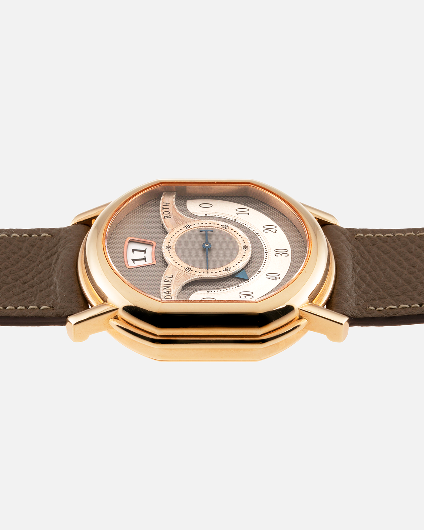 Brand: Daniel Roth Year: 1999 Model: 10th Anniversary Papillon Material: 18k Rose Gold Movement: Daniel Roth Calibre DR113 Case Diameter: 35mm X 41mm X 11mm Bracelet/Strap: Nostime Taupe Textured Calf Strap with 18k Rose Gold Tang Buckle